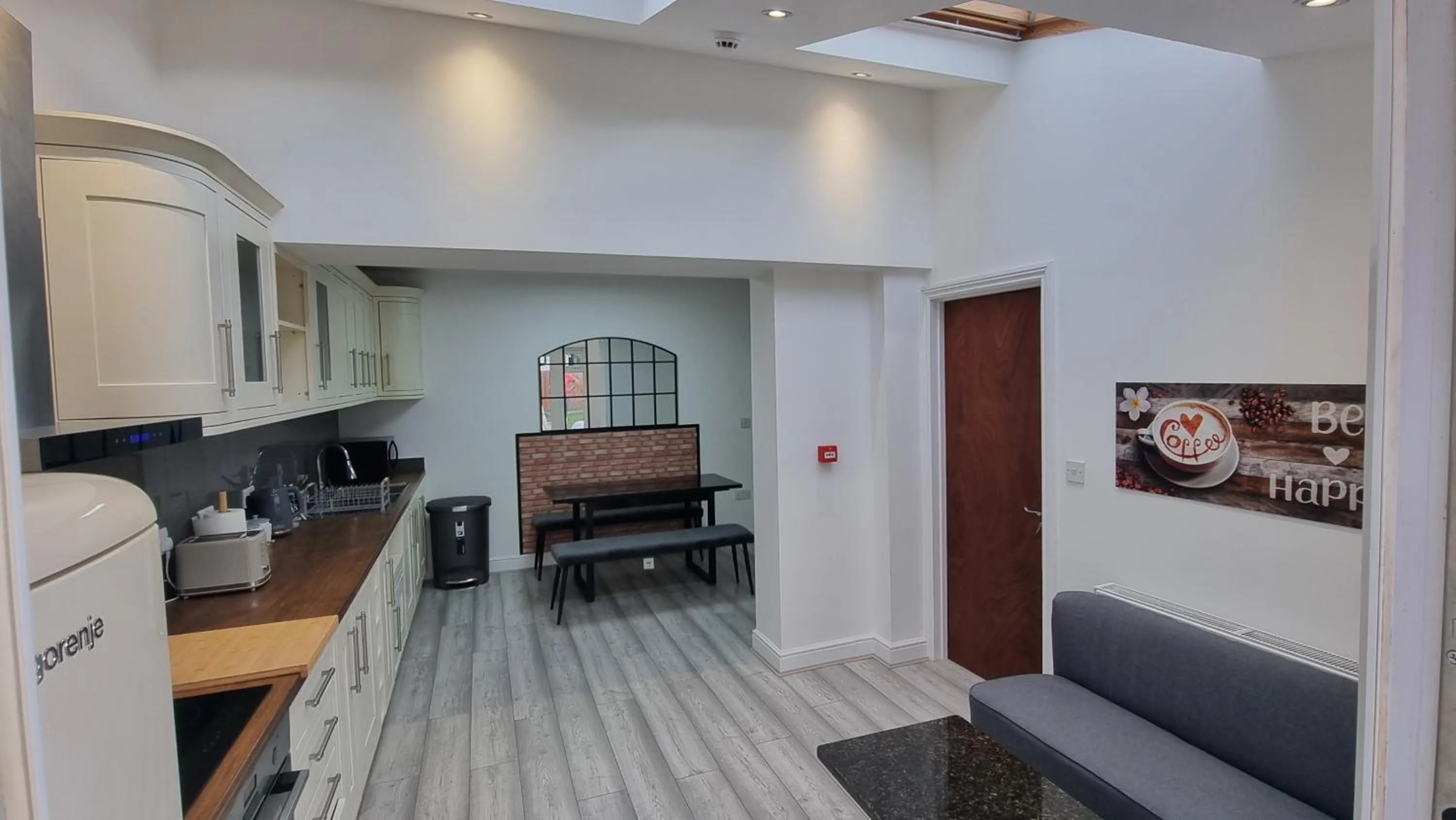 Kitchen or kitchenette in Stylish Suites with kitchenette