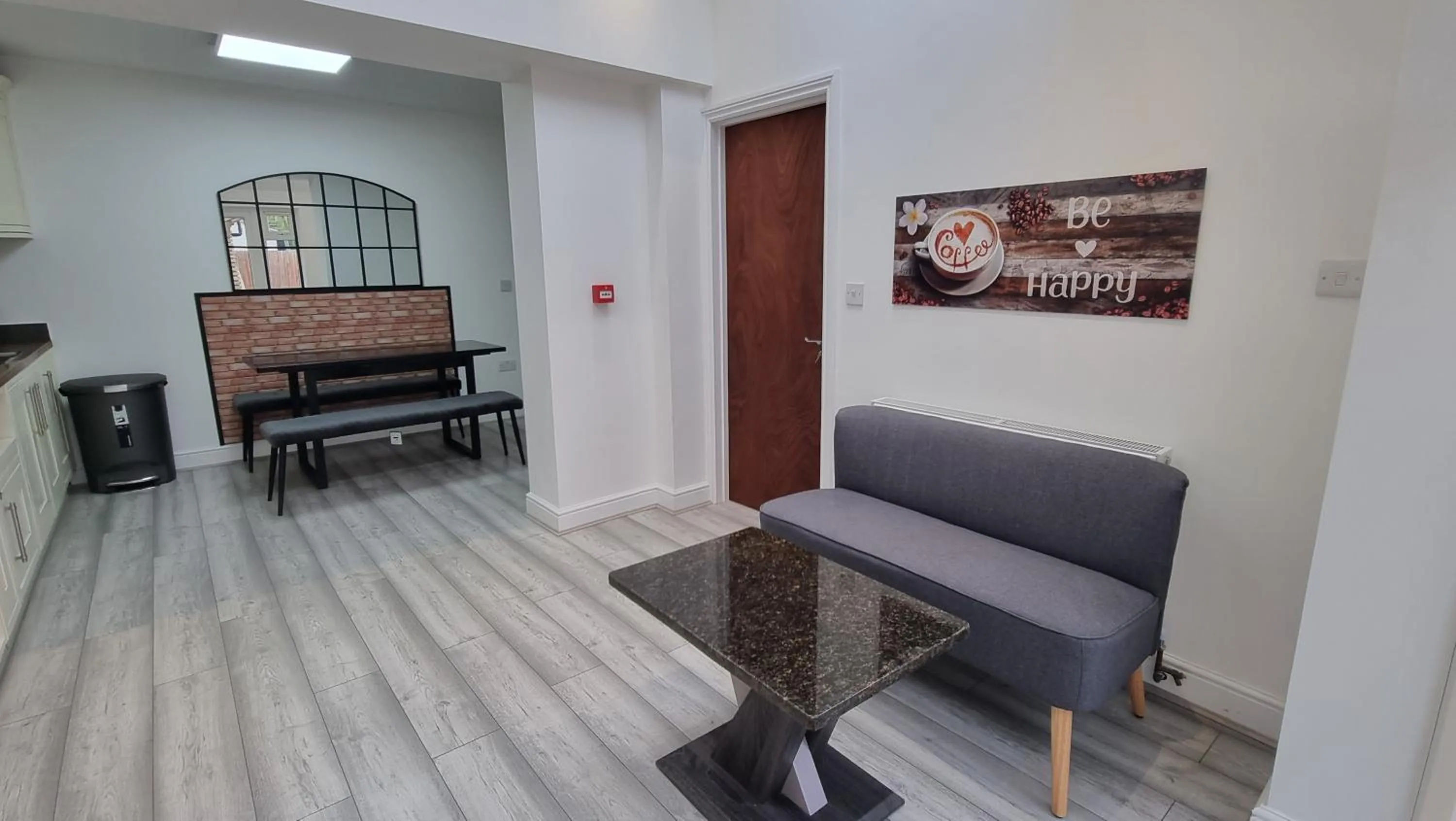 Living room in Stylish Suites with kitchenette