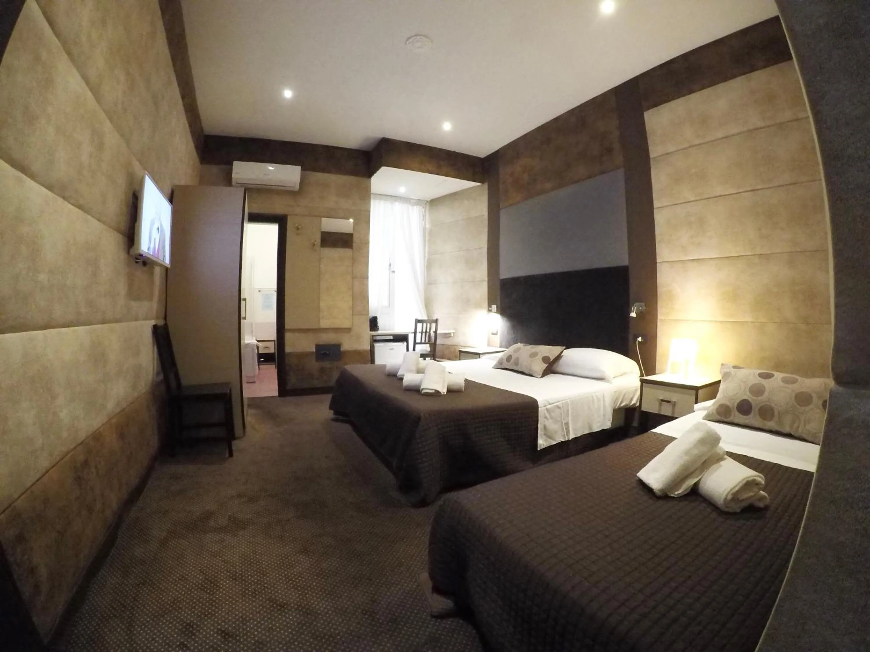 Bed in Blue Suite Vatican Guesthouse