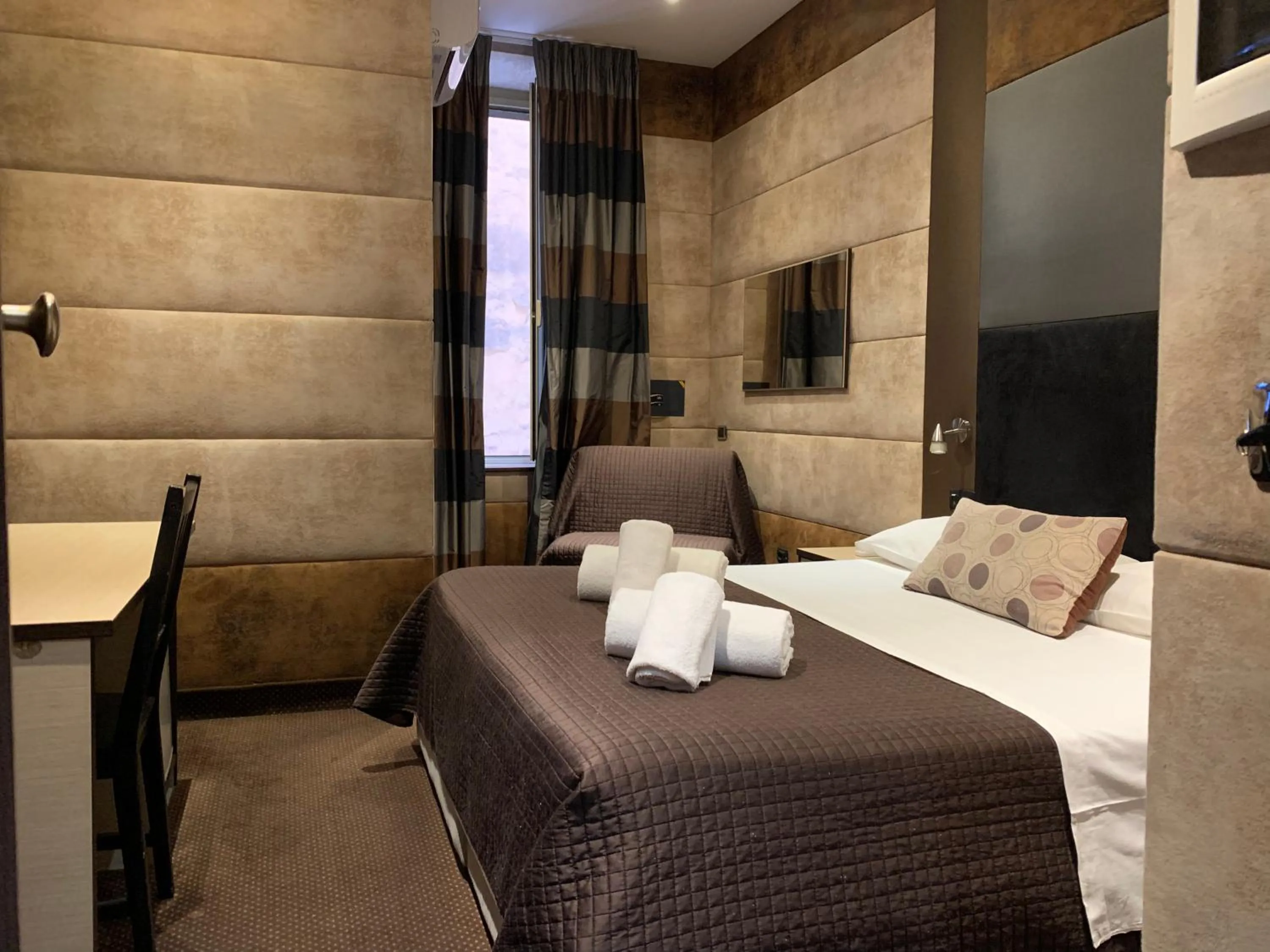 Bed in Blue Suite Vatican Guesthouse