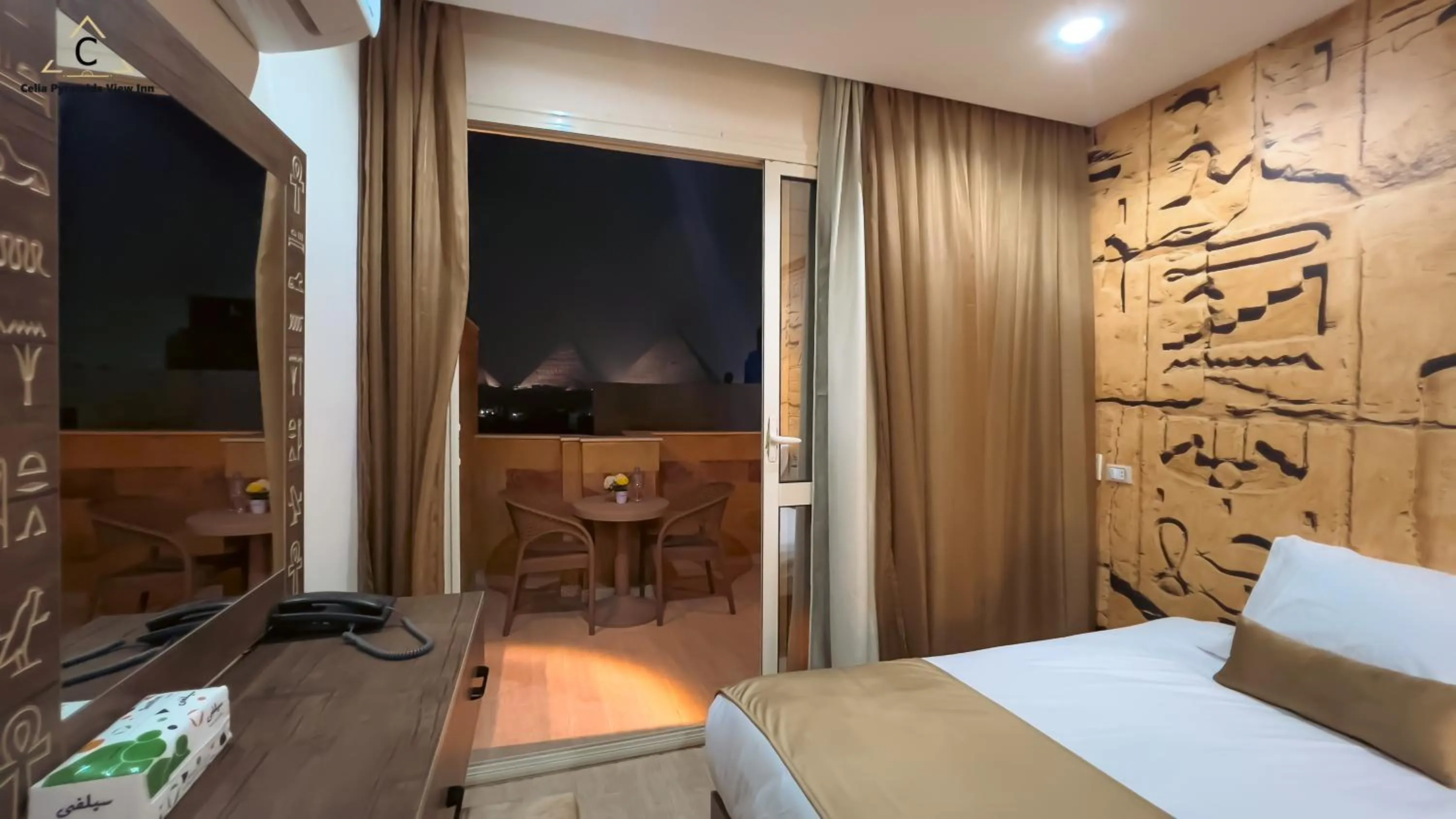 Bedroom, Bed in Celia Pyramids View inn