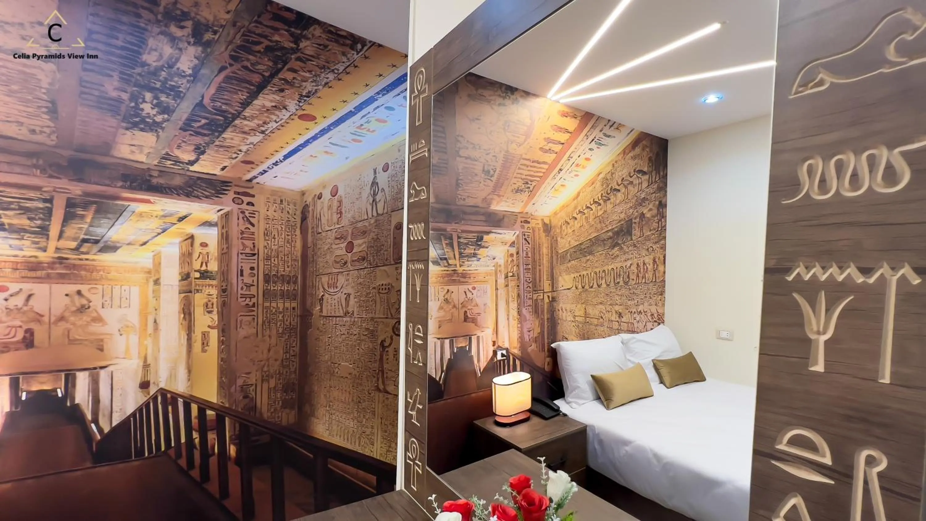 Bed in Celia Pyramids View inn