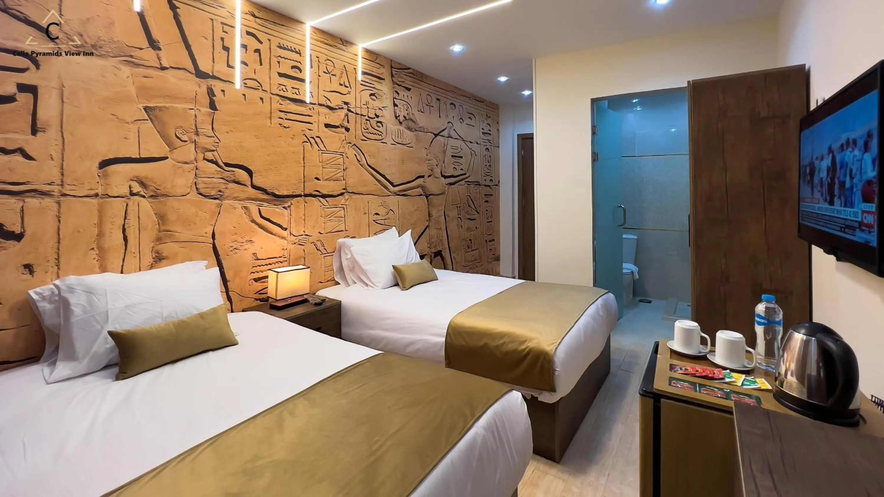 Bed in Celia Pyramids View inn