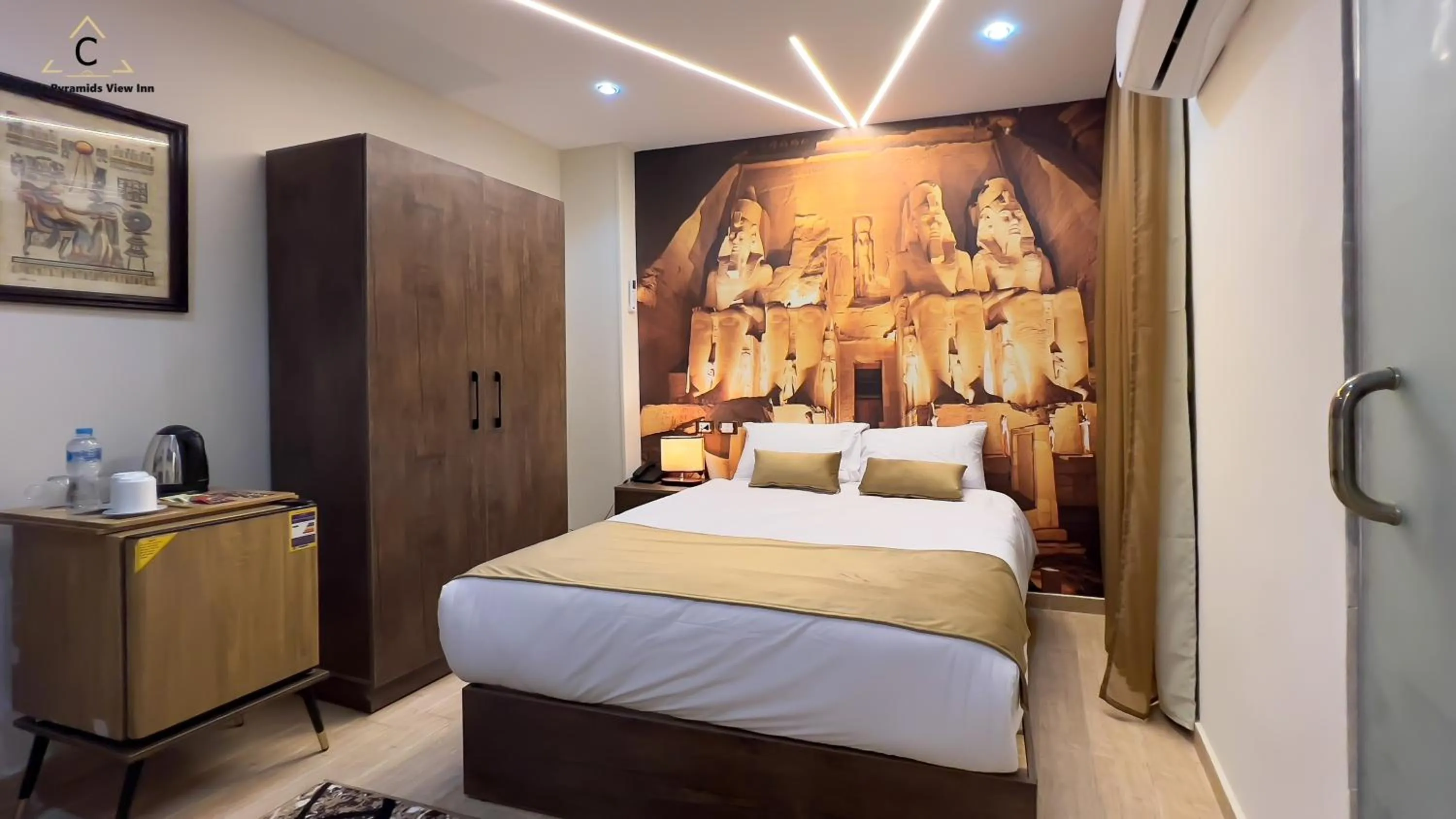 Bed in Celia Pyramids View inn