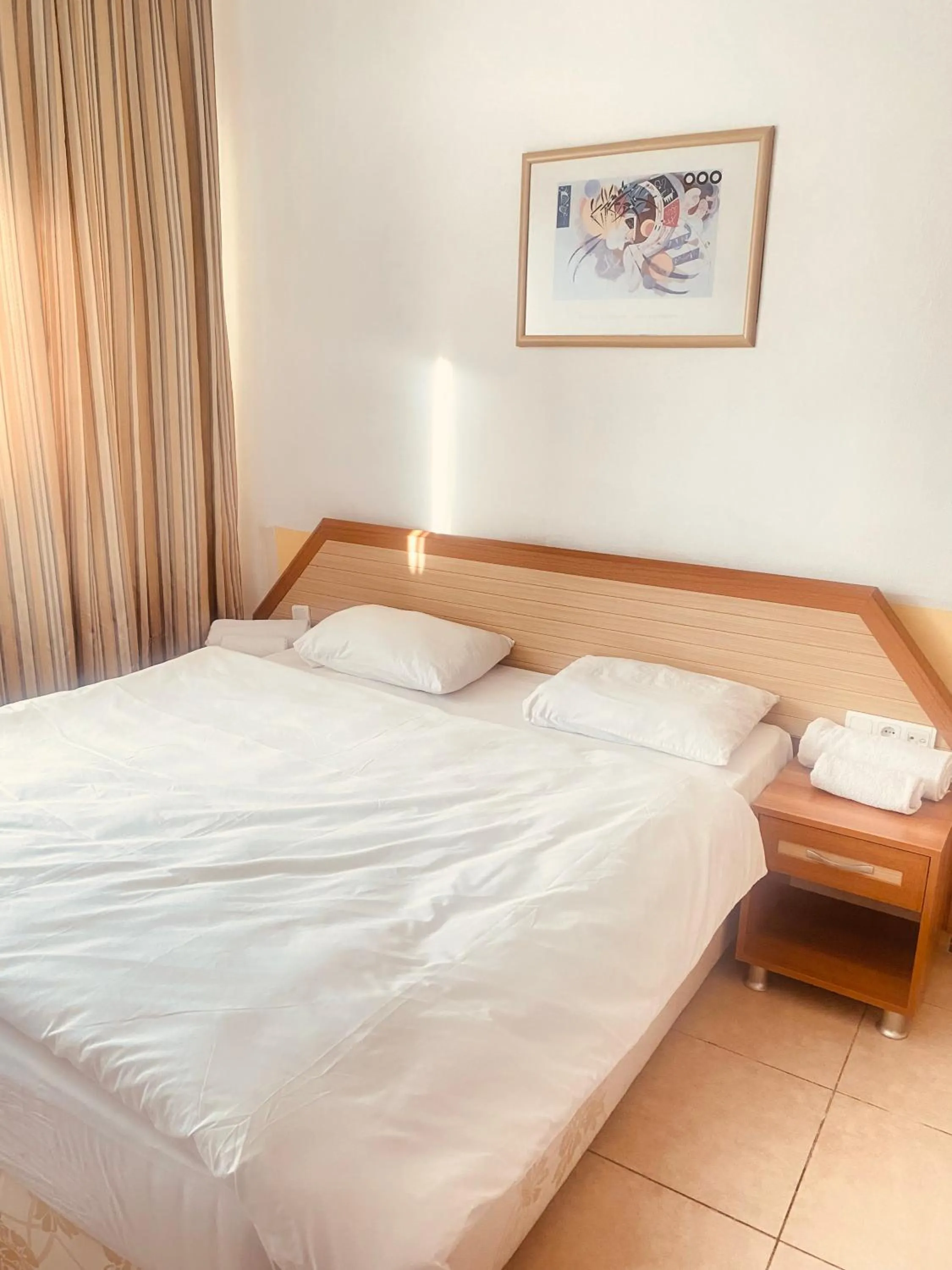 Bed in Agora Boutique Apart Hotel