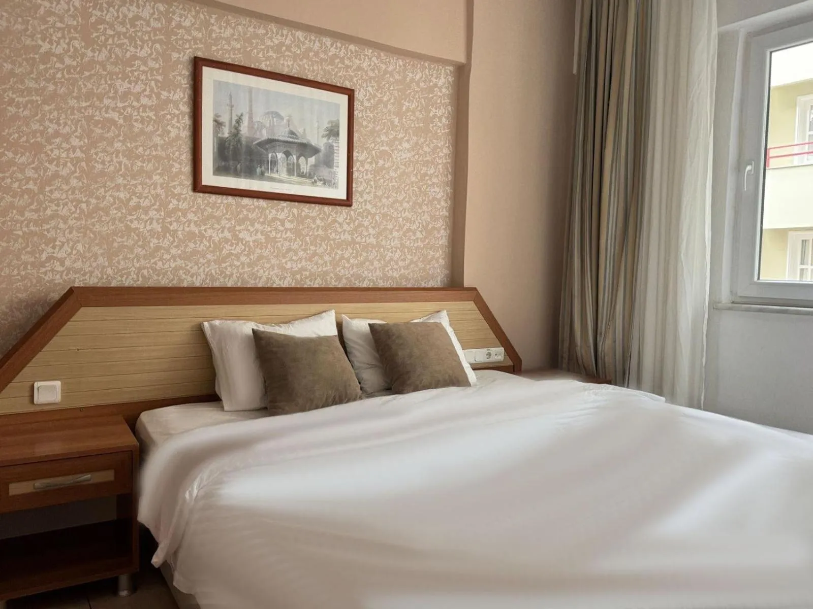 Bed in Agora Boutique Apart Hotel