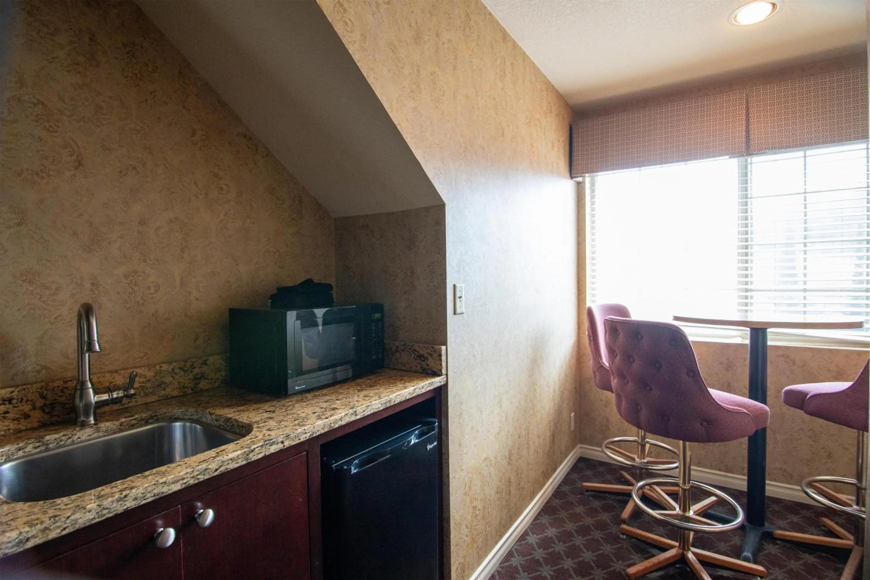 Bedroom in The Bard's Inn - BW Signature Collection by Best Western