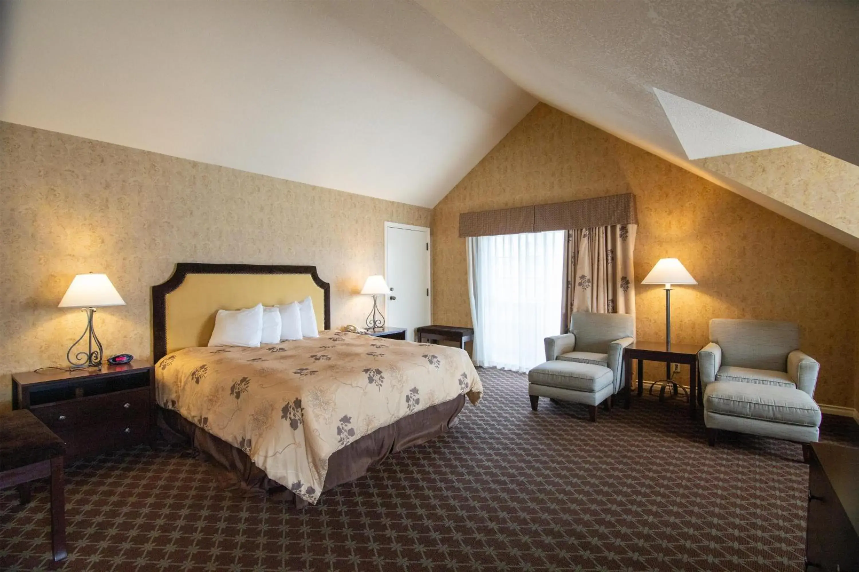 King Suite with Jetted Tub and Balcony in The Bard's Inn - BW Signature Collection by Best Western King Suite with Jetted Tub and Balcony in The Bard's Inn - BW Signature Collection by Best Western