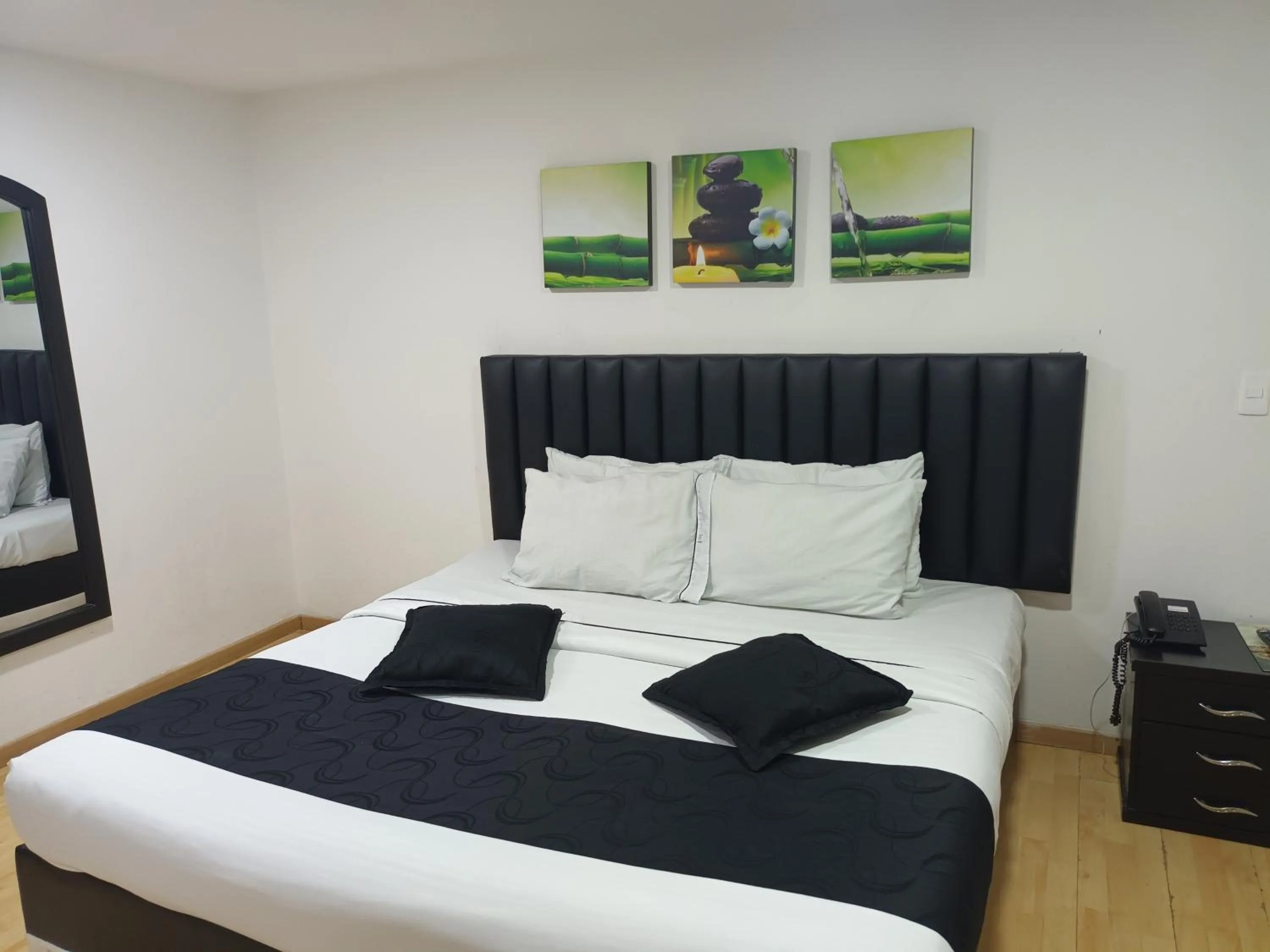 Bed in Hotel Santiago Plaza