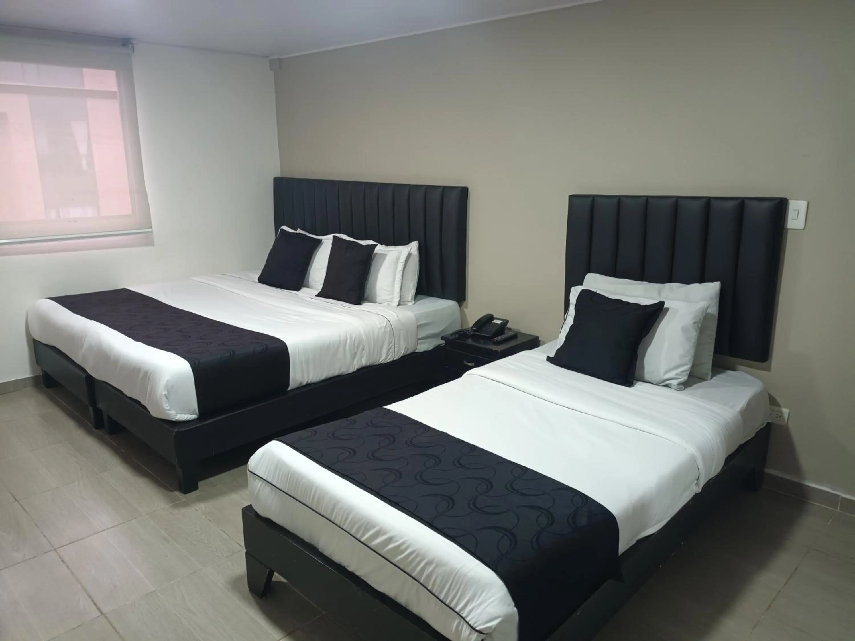 Bed in Hotel Santiago Plaza