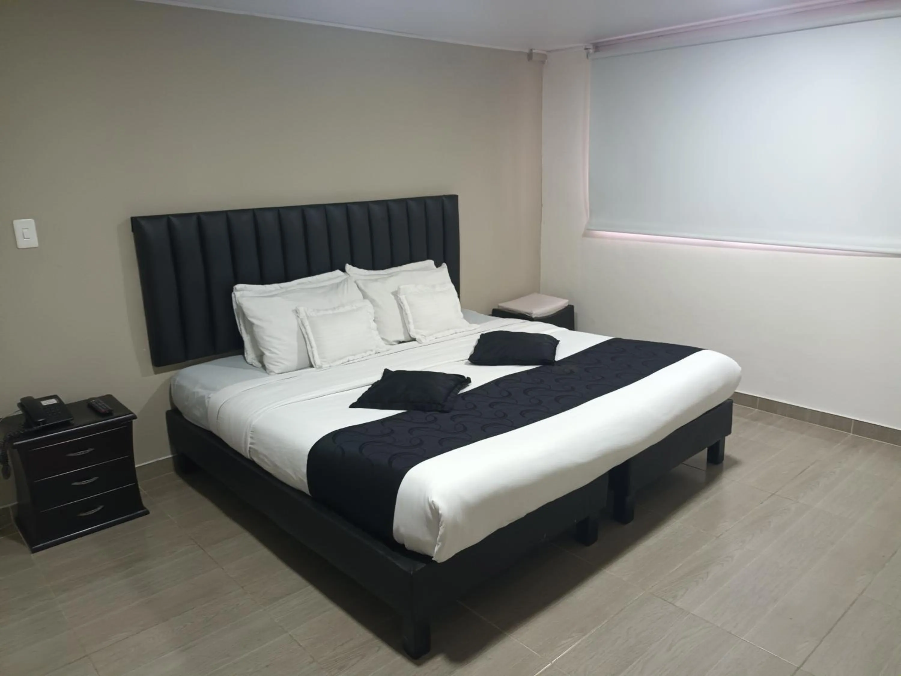 Bed in Hotel Santiago Plaza