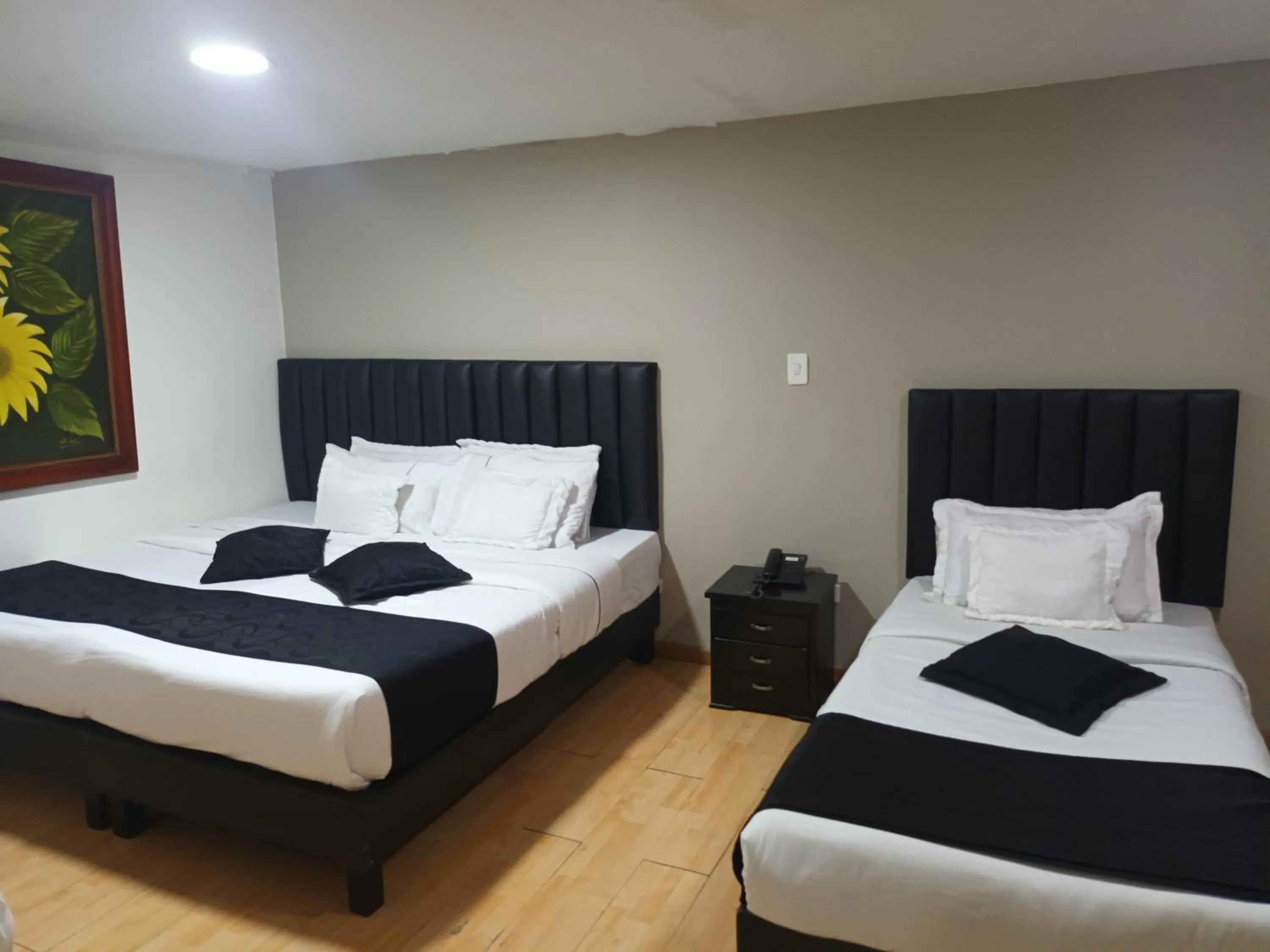 Bed in Hotel Santiago Plaza