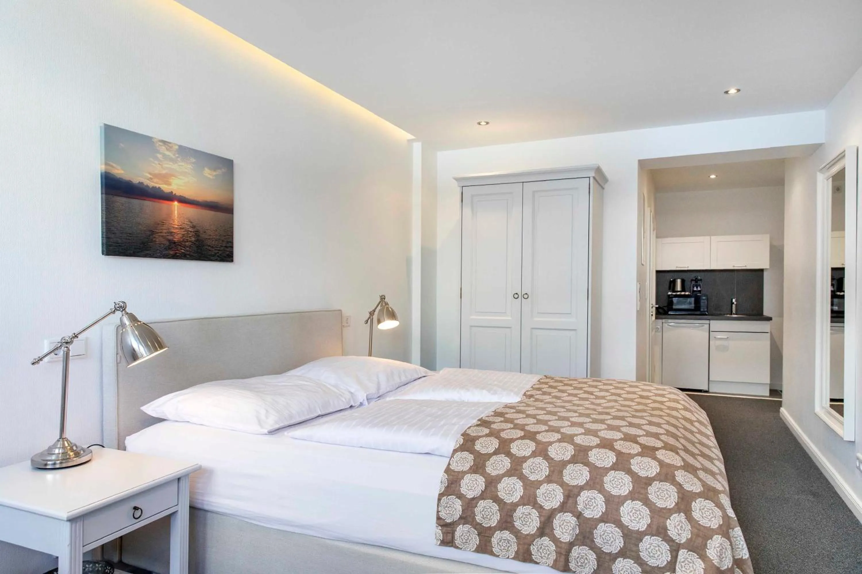 Bed in Luxx City Apartments