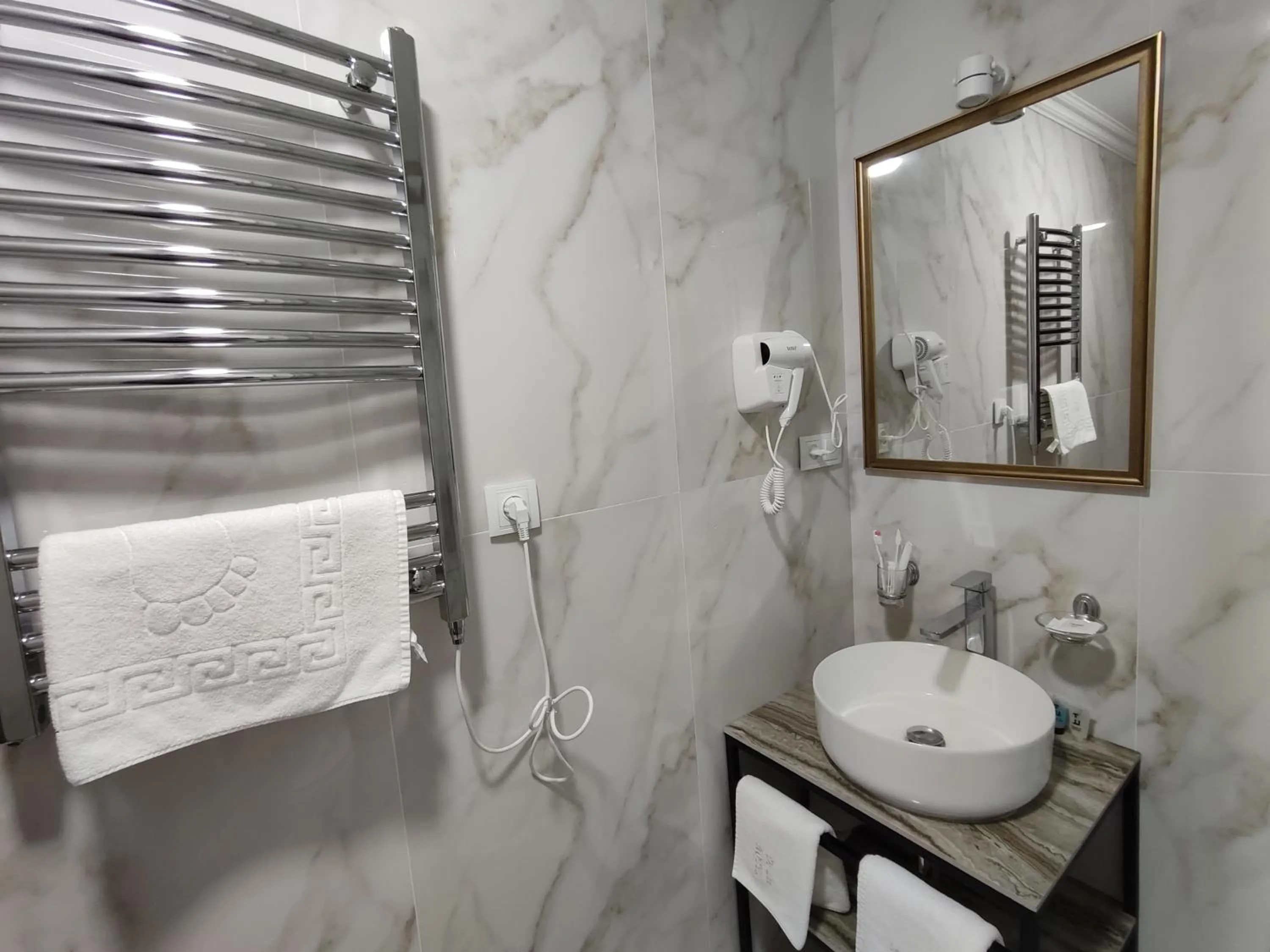 Bathroom in DeLin Hotel And Tours