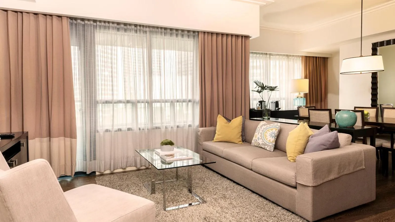 Living room in Aruga Apartments by Rockwell Makati