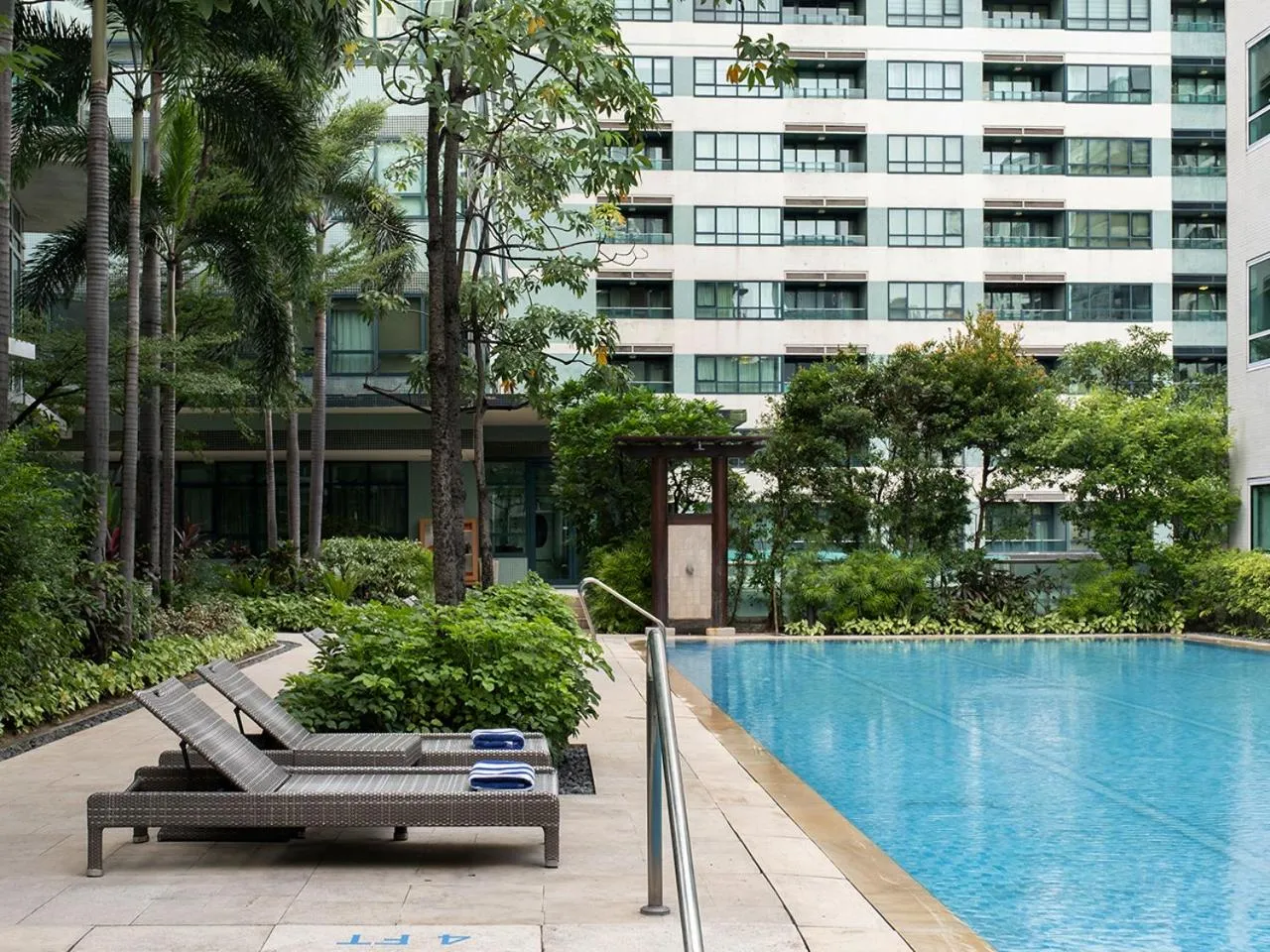 Swimming pool in Aruga Apartments by Rockwell Makati
