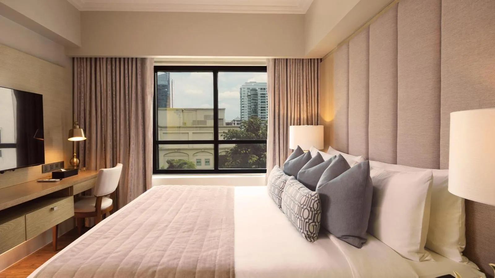 Bed in Aruga Apartments by Rockwell Makati