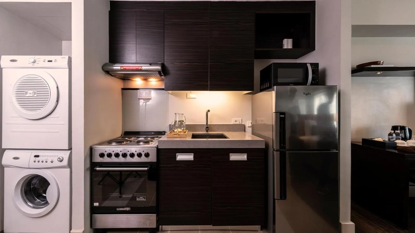 Kitchen or kitchenette in Aruga Apartments by Rockwell Makati