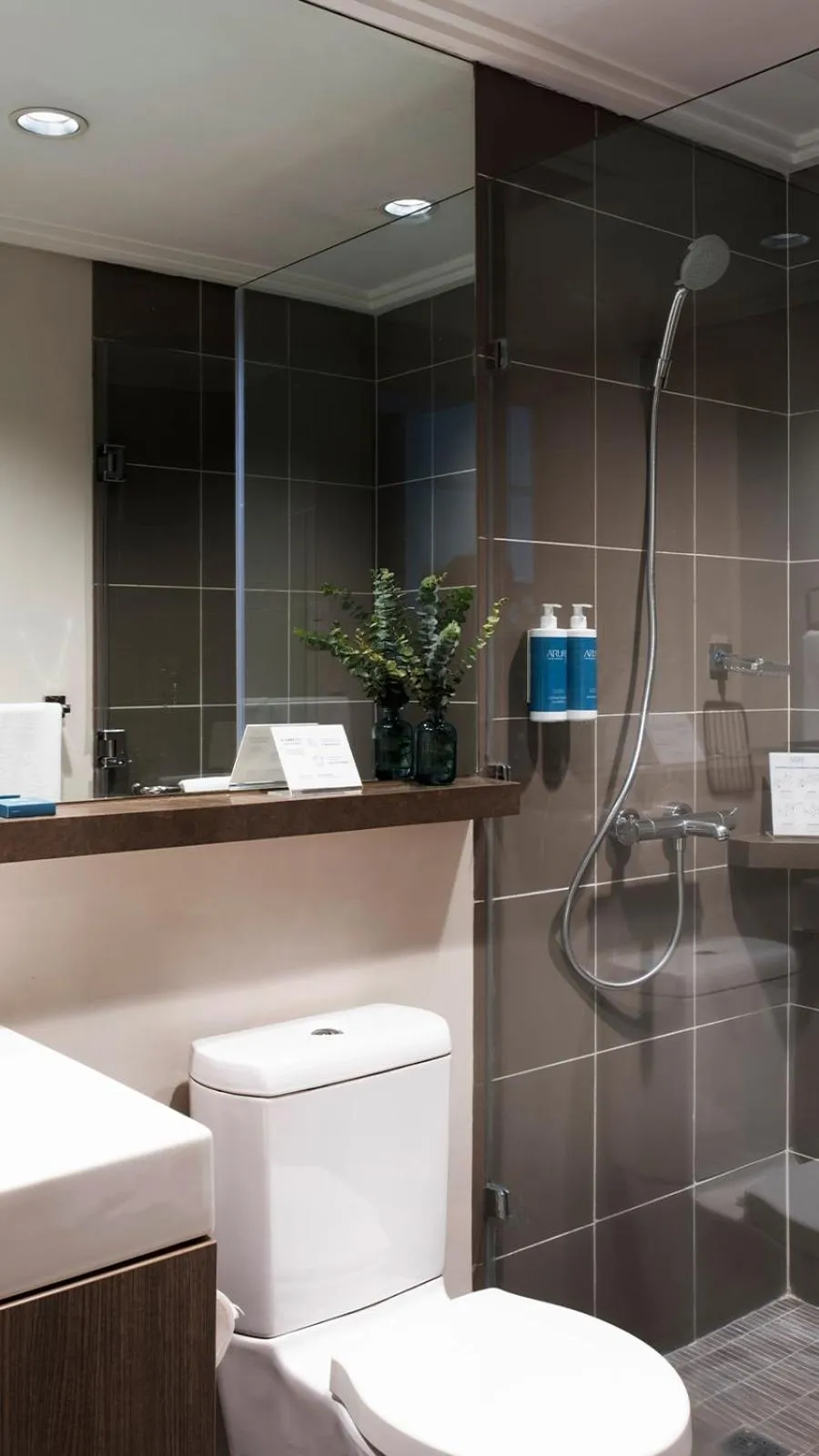 Bathroom in Aruga Apartments by Rockwell Makati