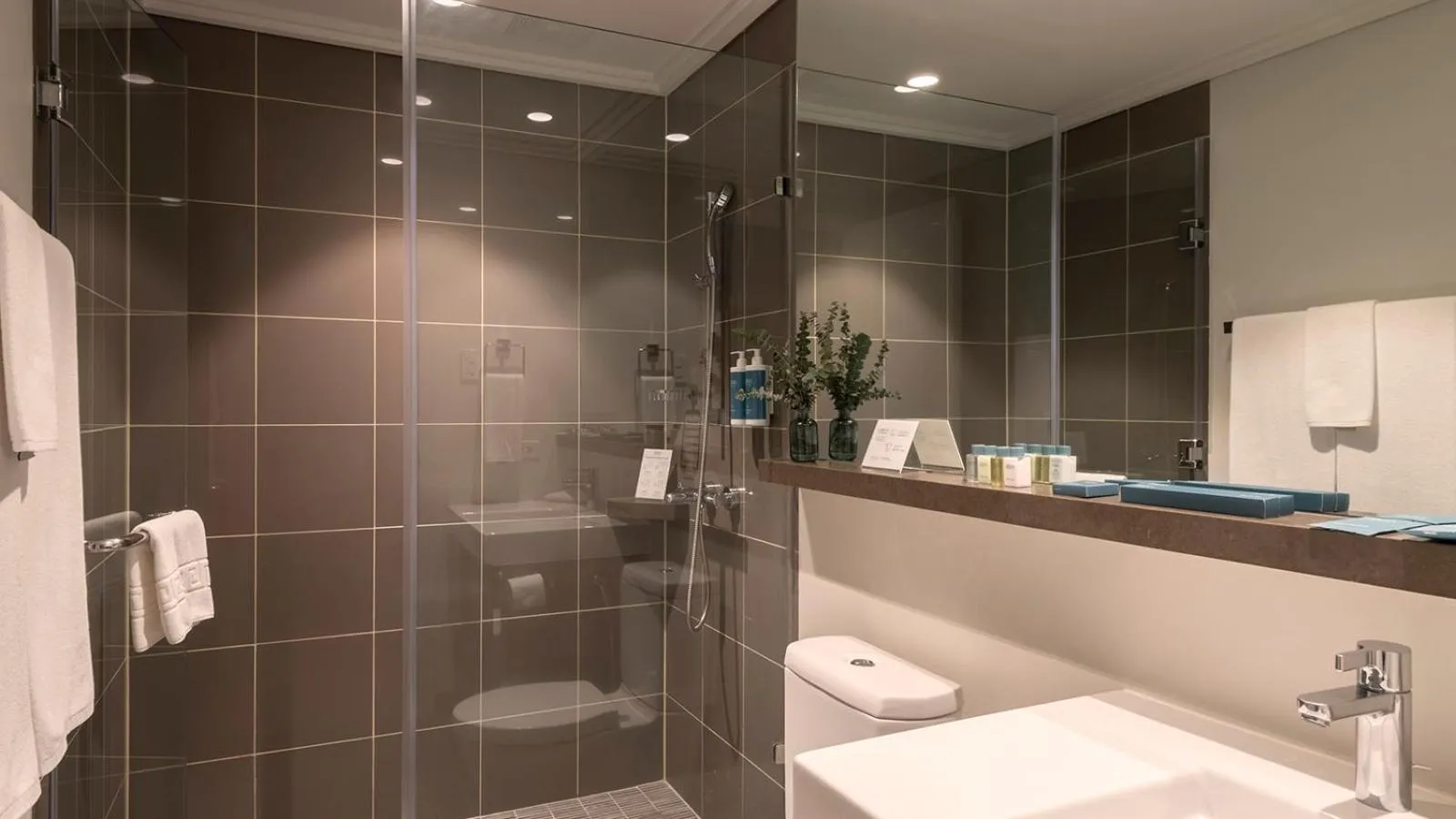 Shower in Aruga Apartments by Rockwell Makati