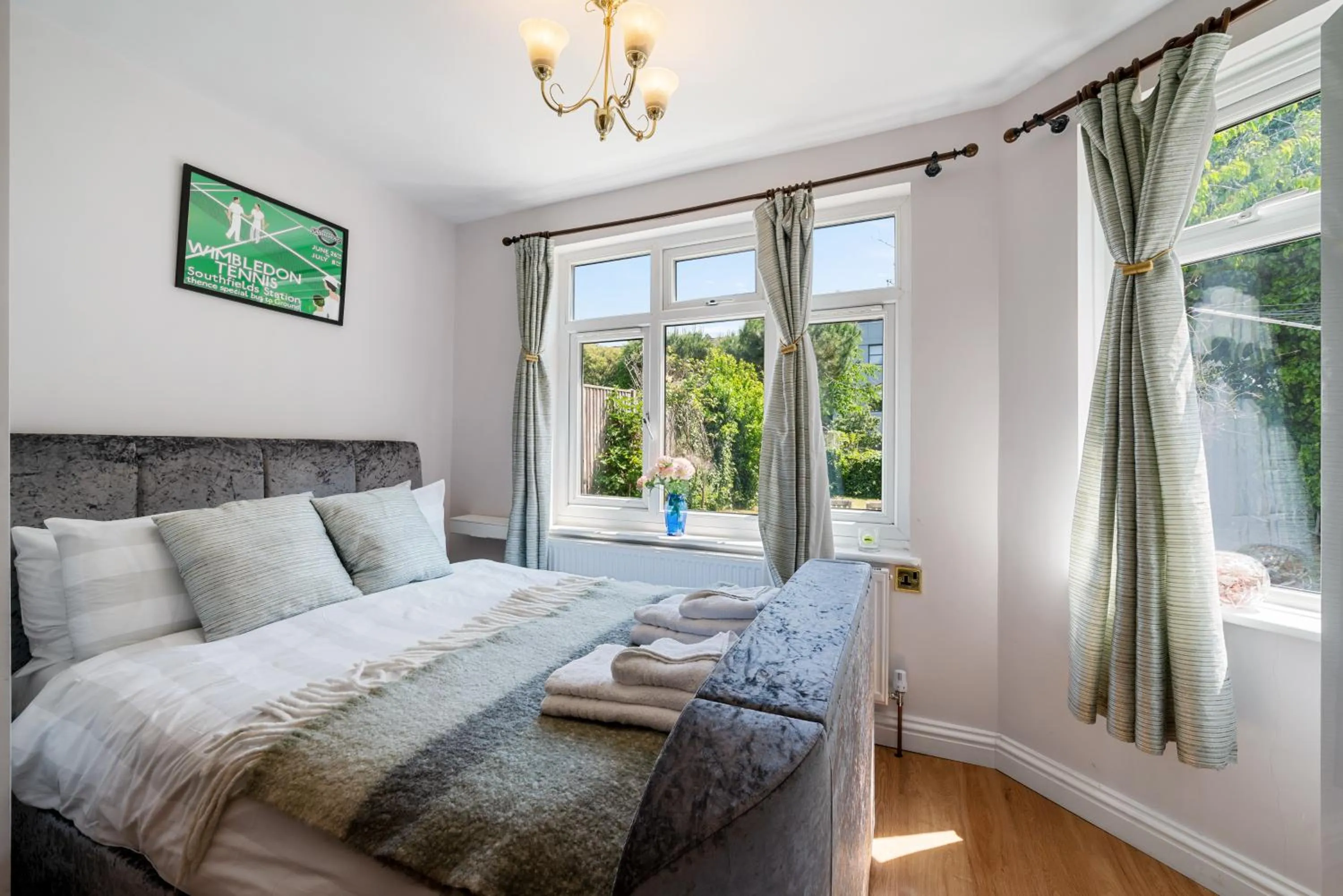 Bedroom, Bed in Lovely garden apartment in Wimbledon Town Centre with private parking by Wimbledon Holiday Lets