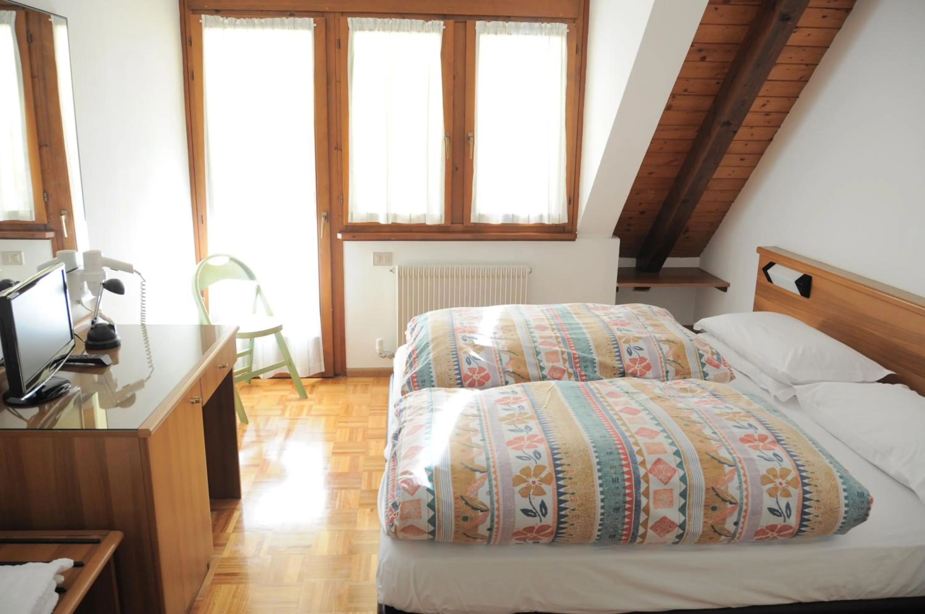 Bedroom in Hotel Europa Cembra