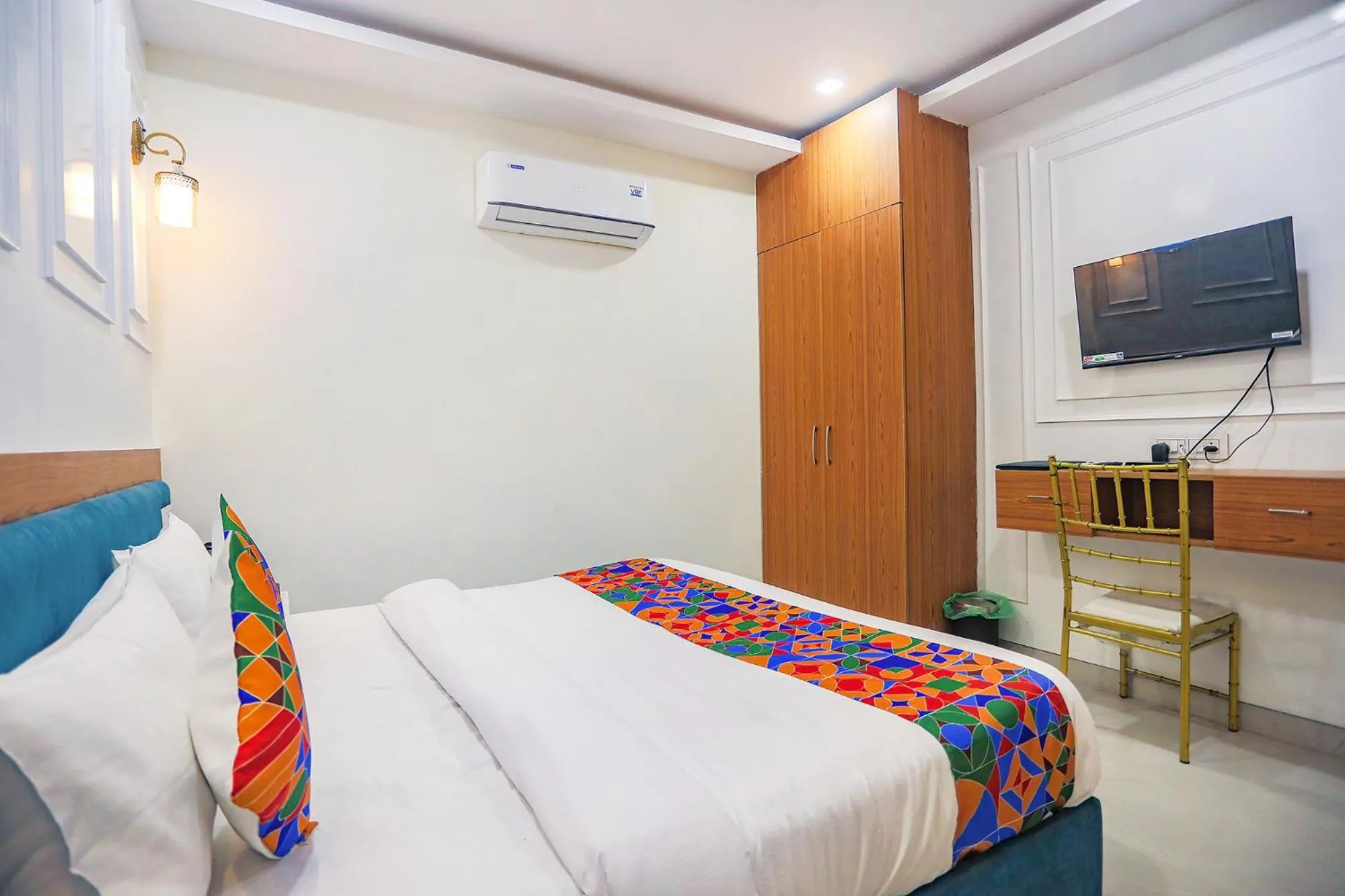 Bed in FabHotel Cosmos