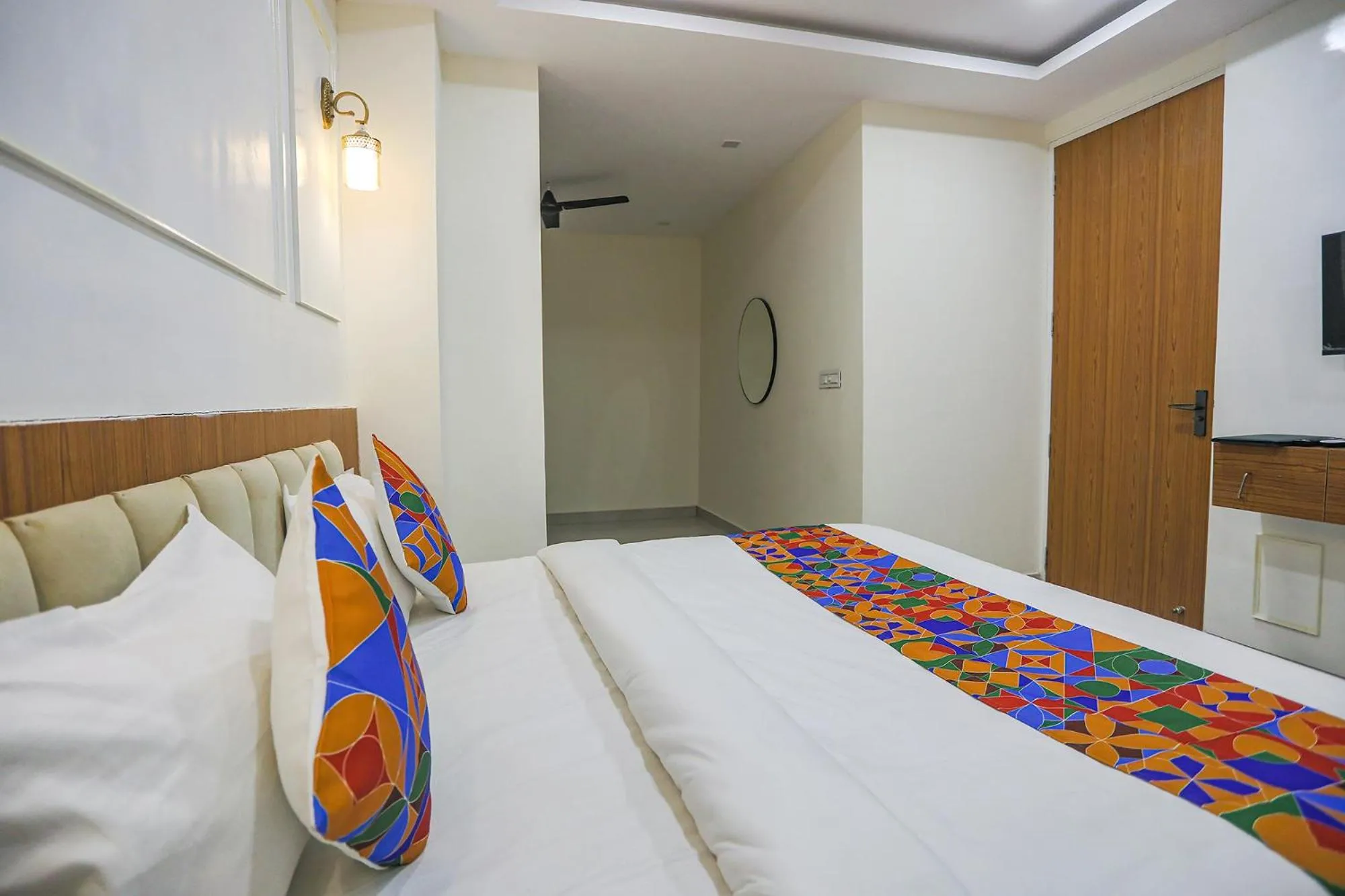 Bed in FabHotel Cosmos