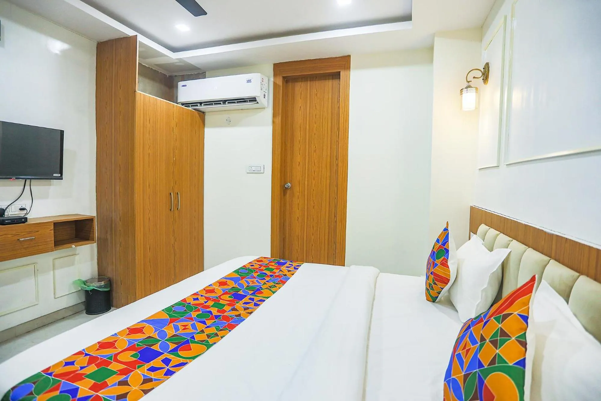 Bed in FabHotel Cosmos