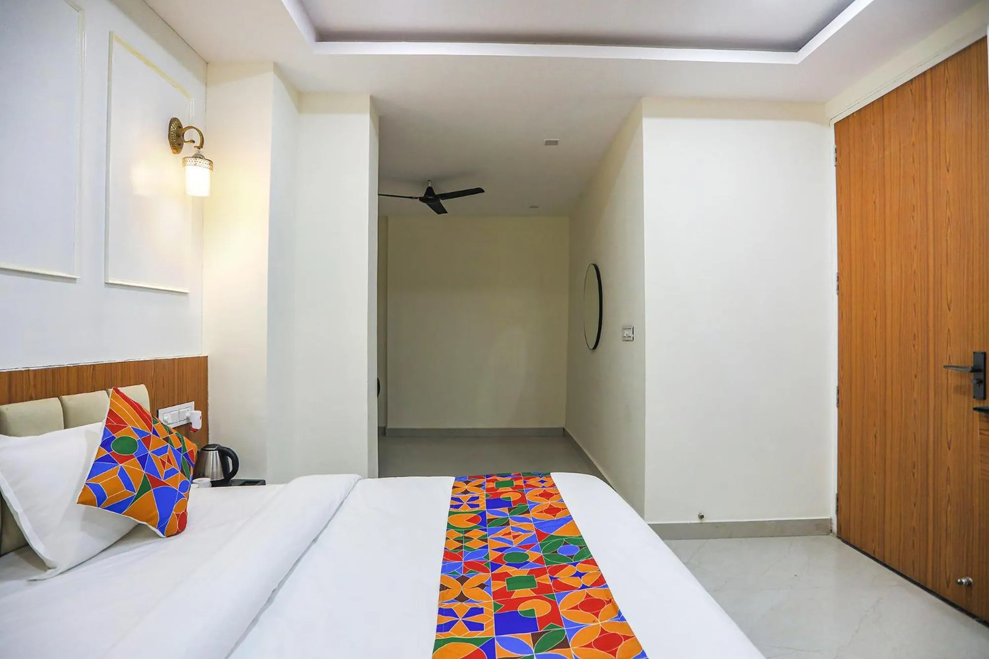 Bed in FabHotel Cosmos