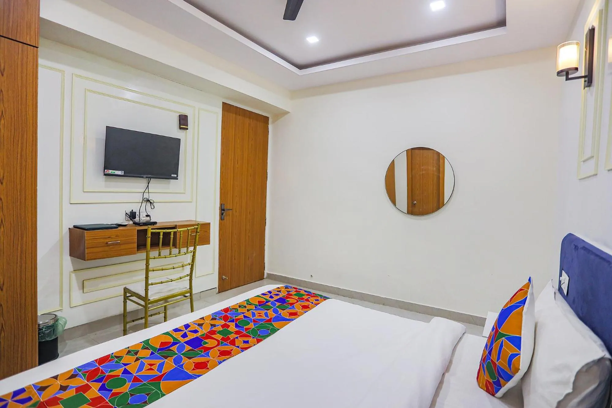 Bed in FabHotel Cosmos