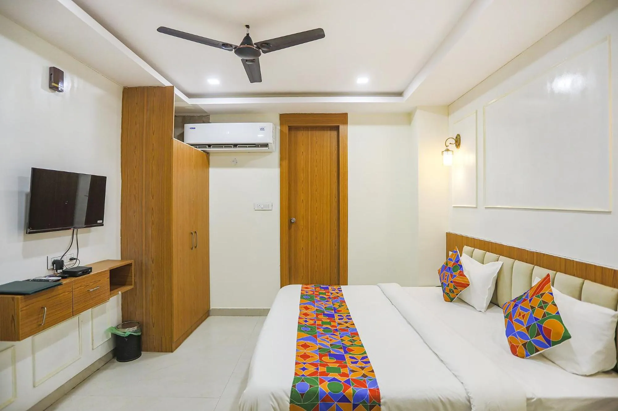 Bed in FabHotel Cosmos