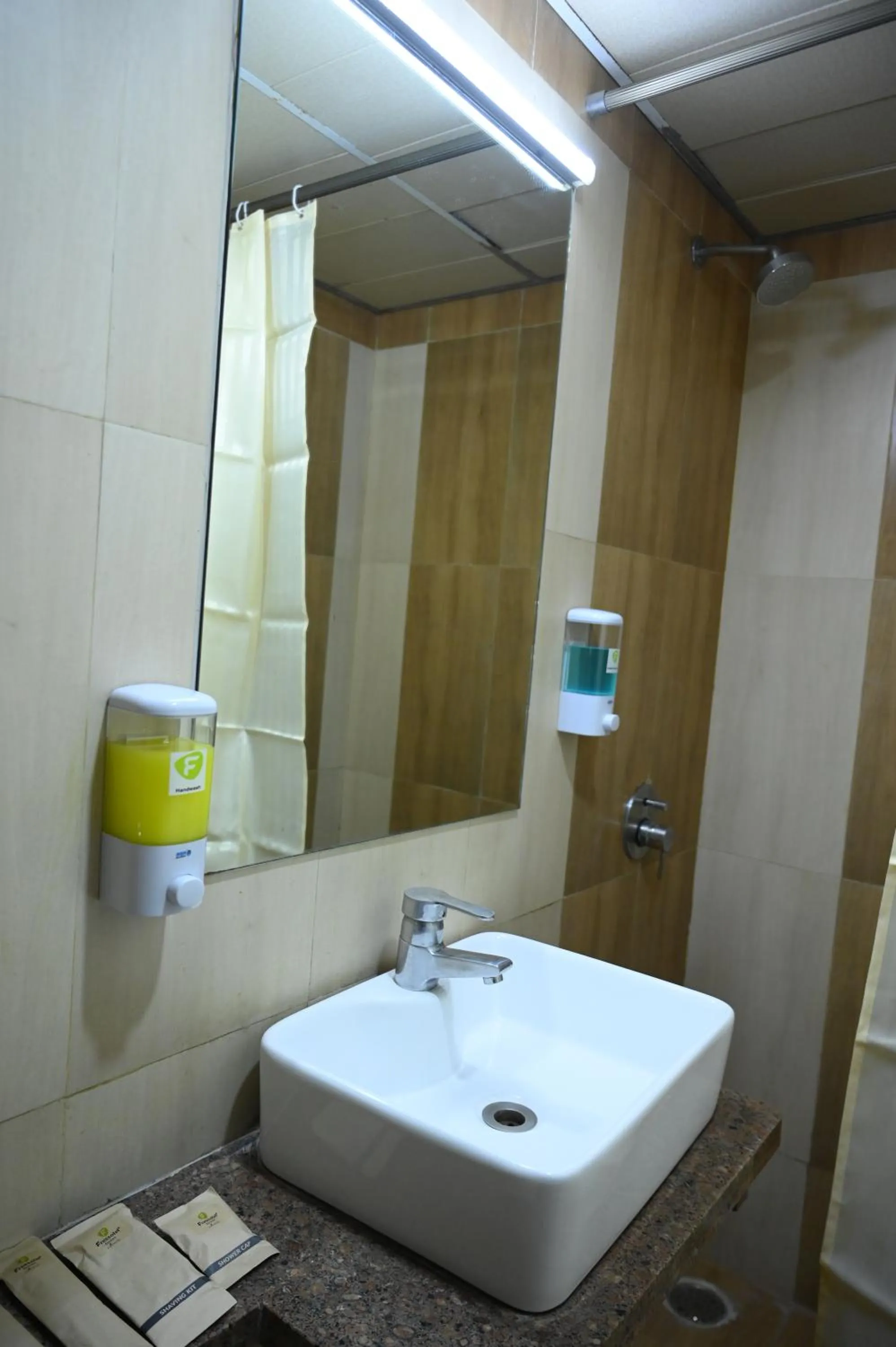 Bathroom in RAJKIYAM - A Business Hotel