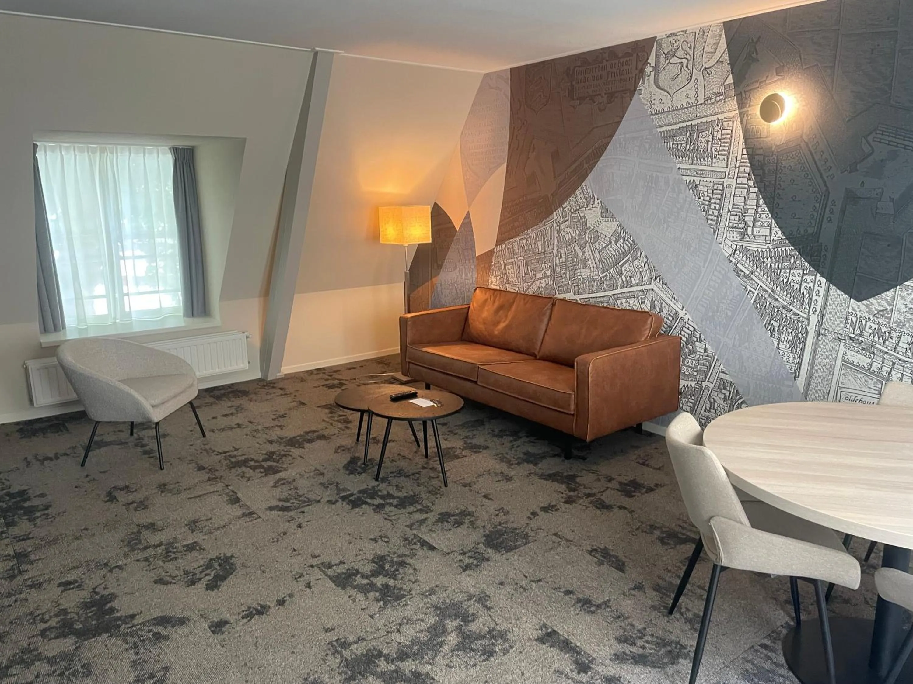 Living room in Fletcher Hotel Paleis Stadhouderlijk Hof