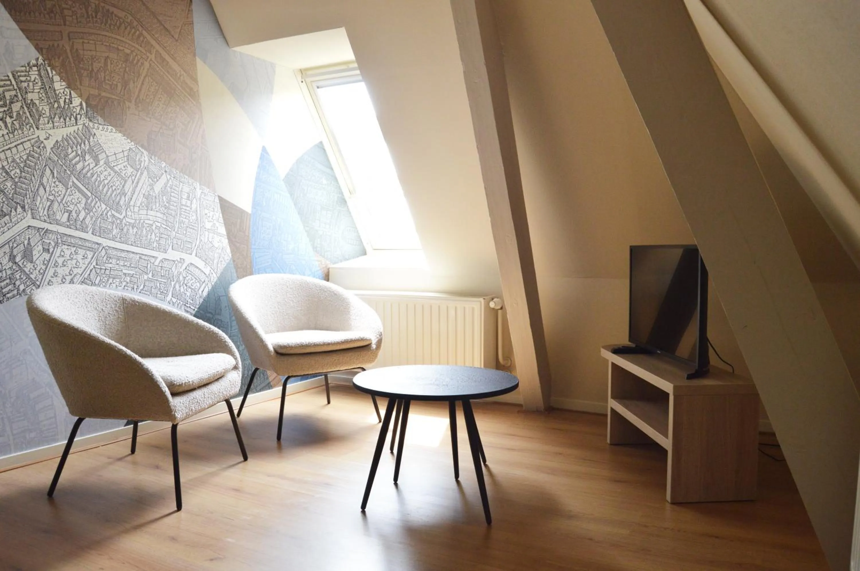 Living room in Fletcher Hotel Paleis Stadhouderlijk Hof