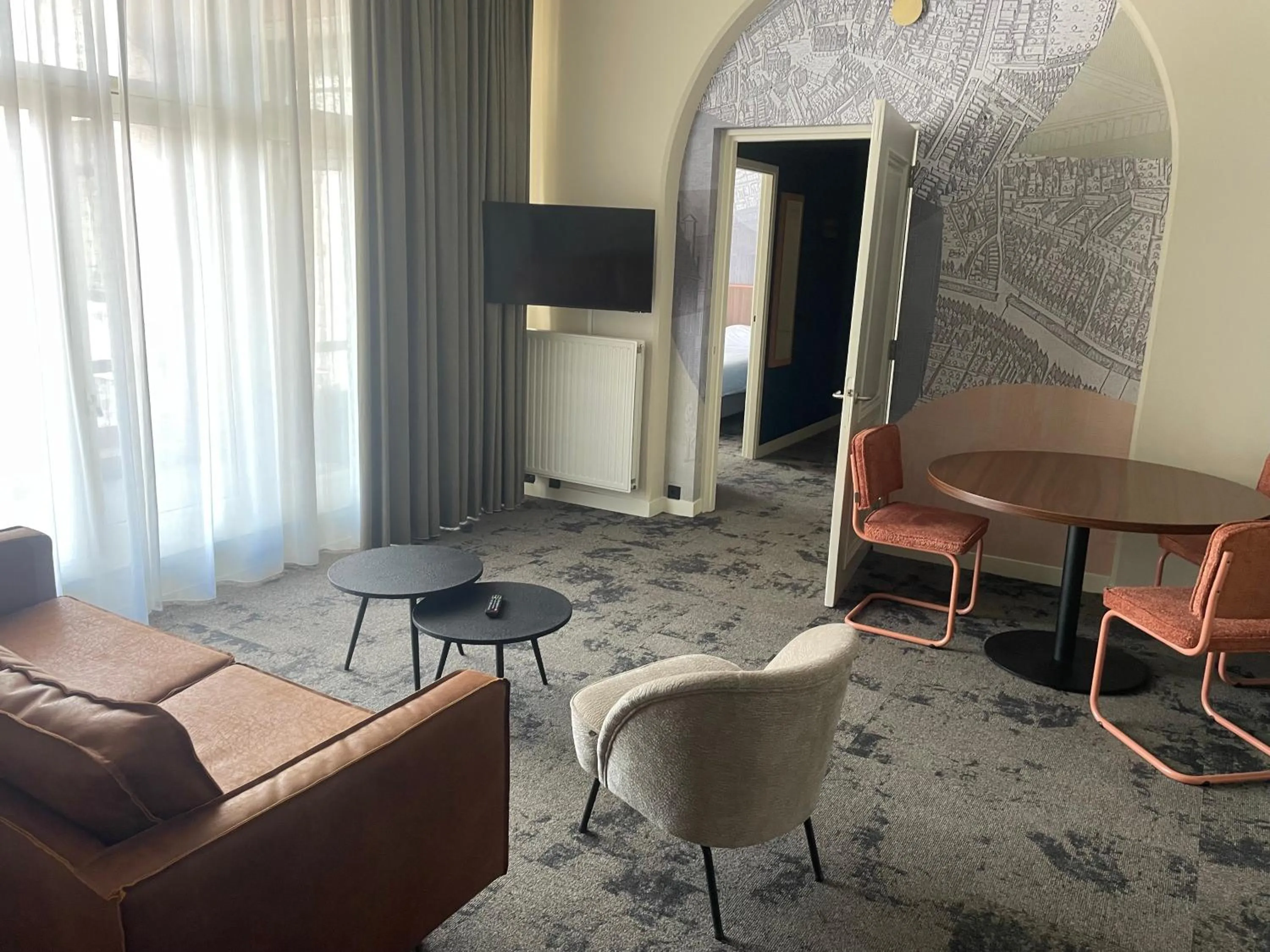 Living room in Fletcher Hotel Paleis Stadhouderlijk Hof