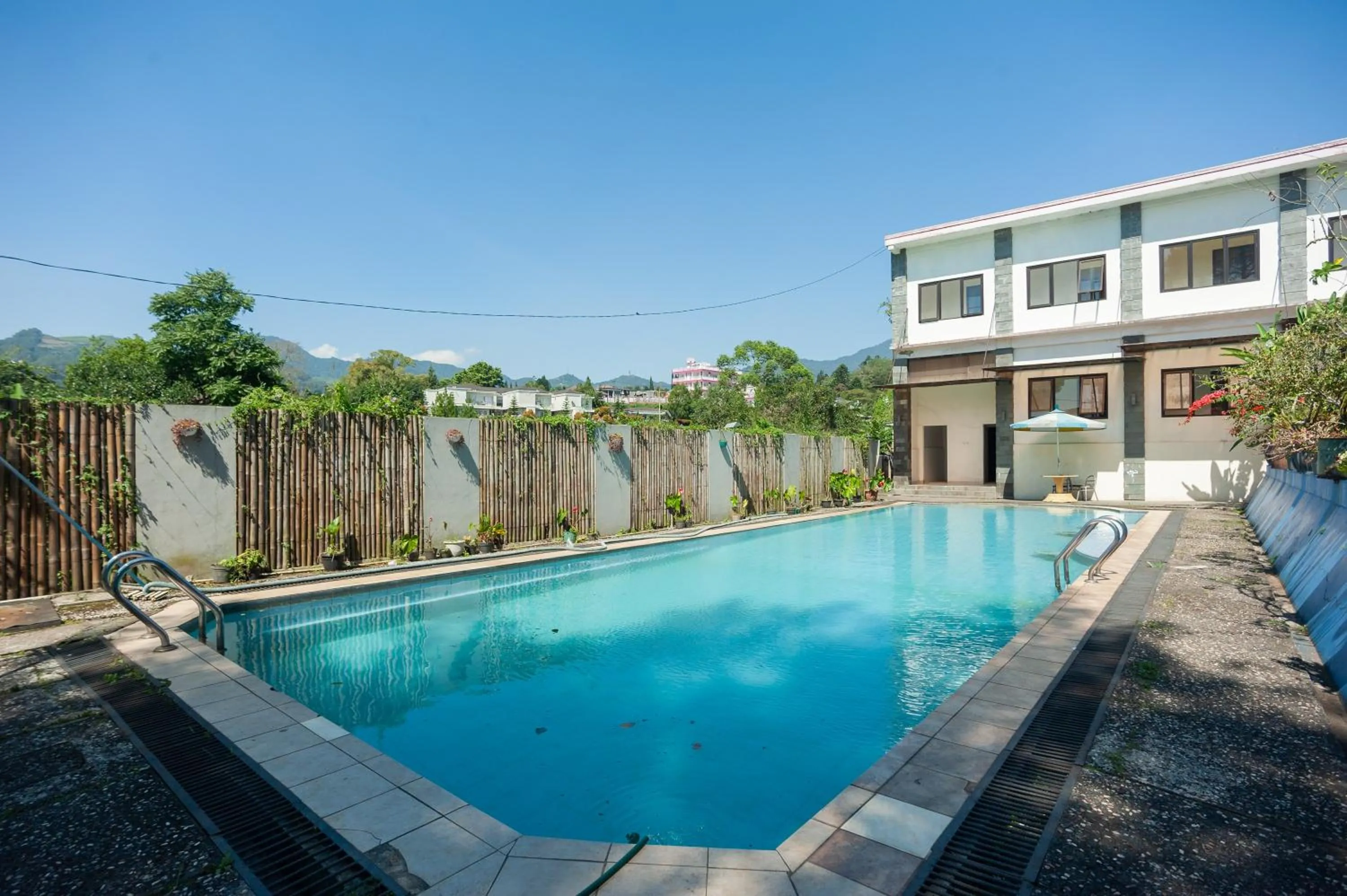 Swimming pool in Urbanview Hotel Syariah Villa SM Cisarua Puncak by RedDoorz