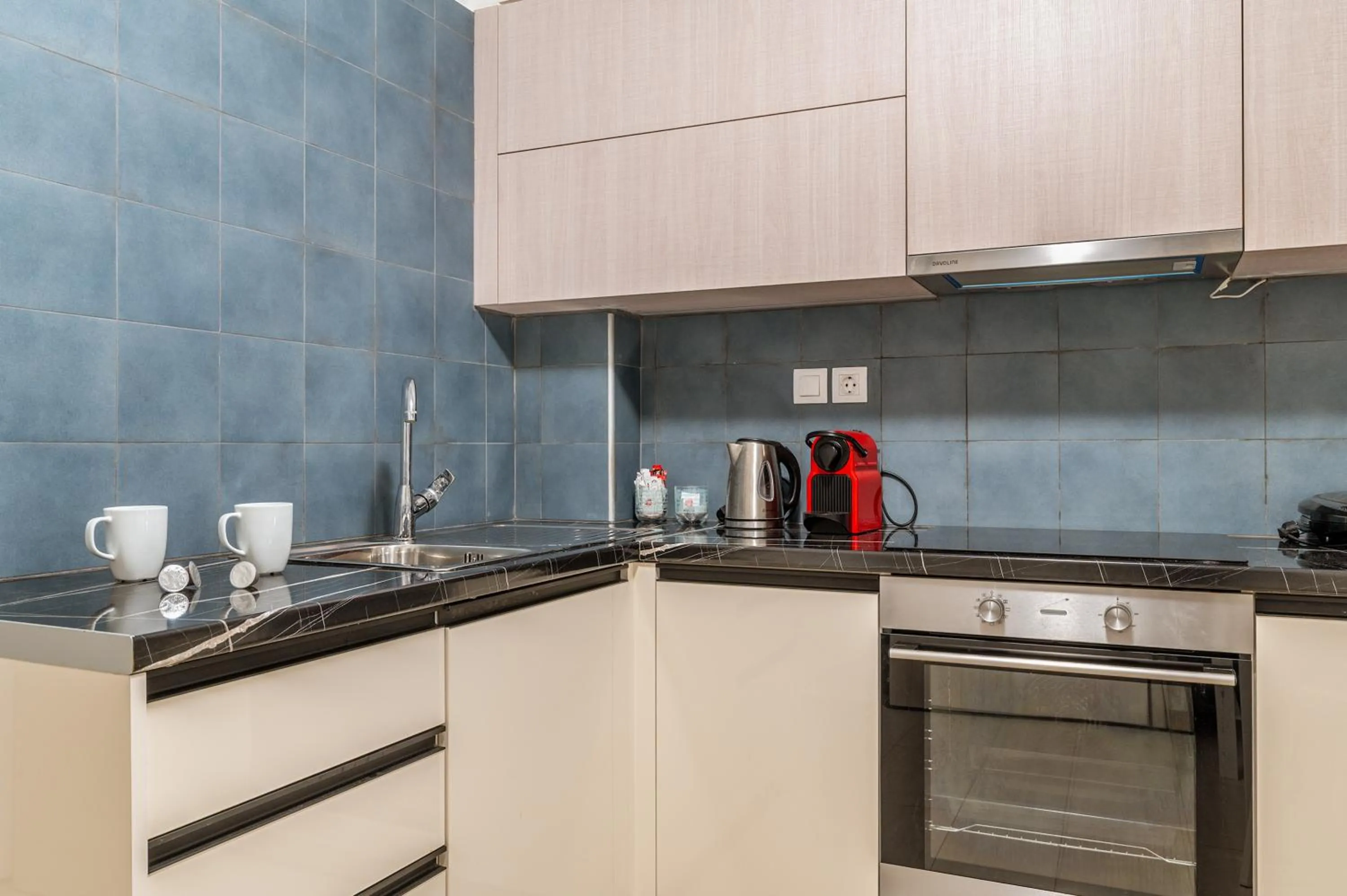 Kitchen or kitchenette in Elvita Apartments 4