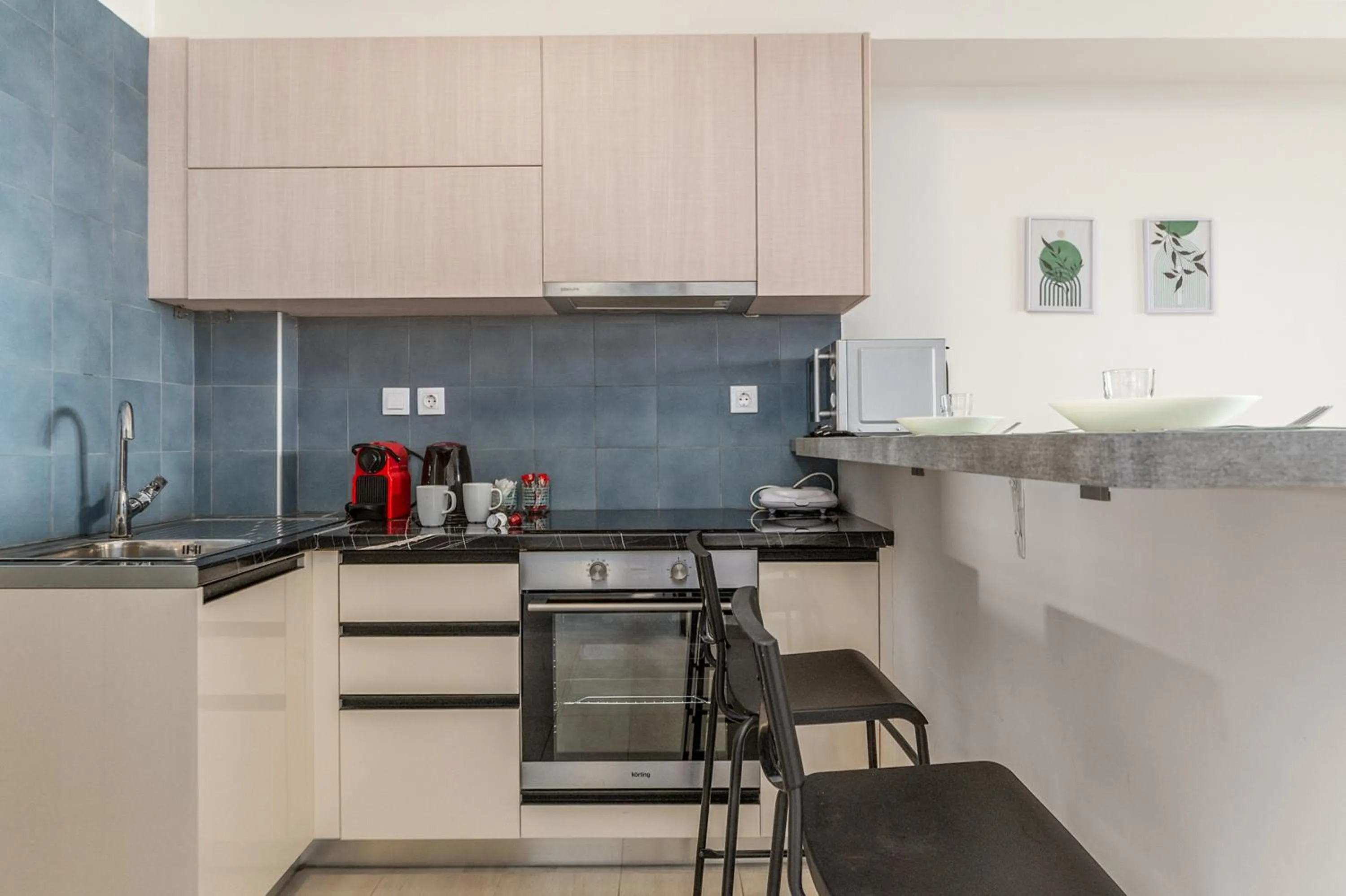 Kitchen or kitchenette in Elvita Apartments 4