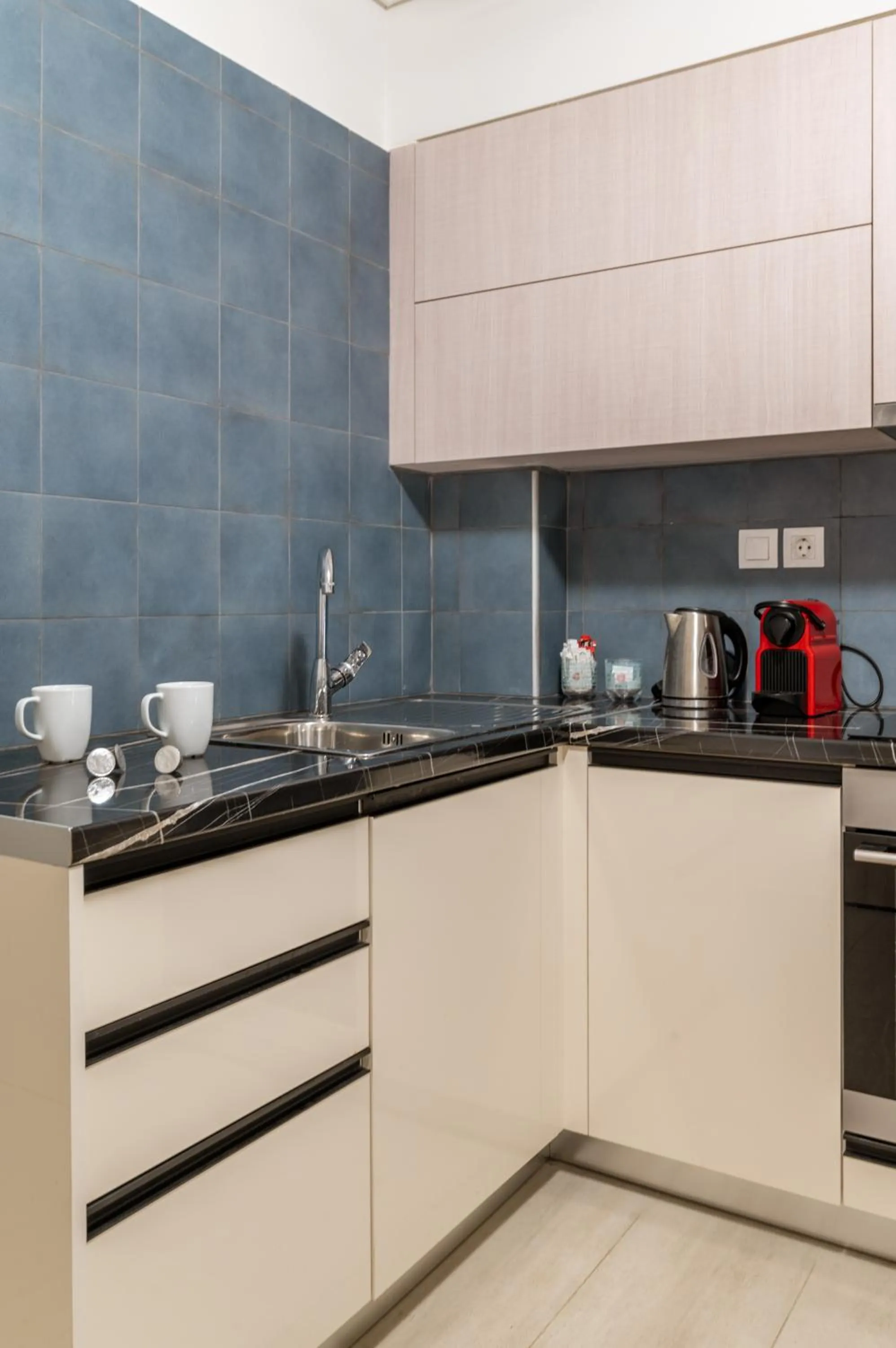 Kitchen or kitchenette in Elvita Apartments 4