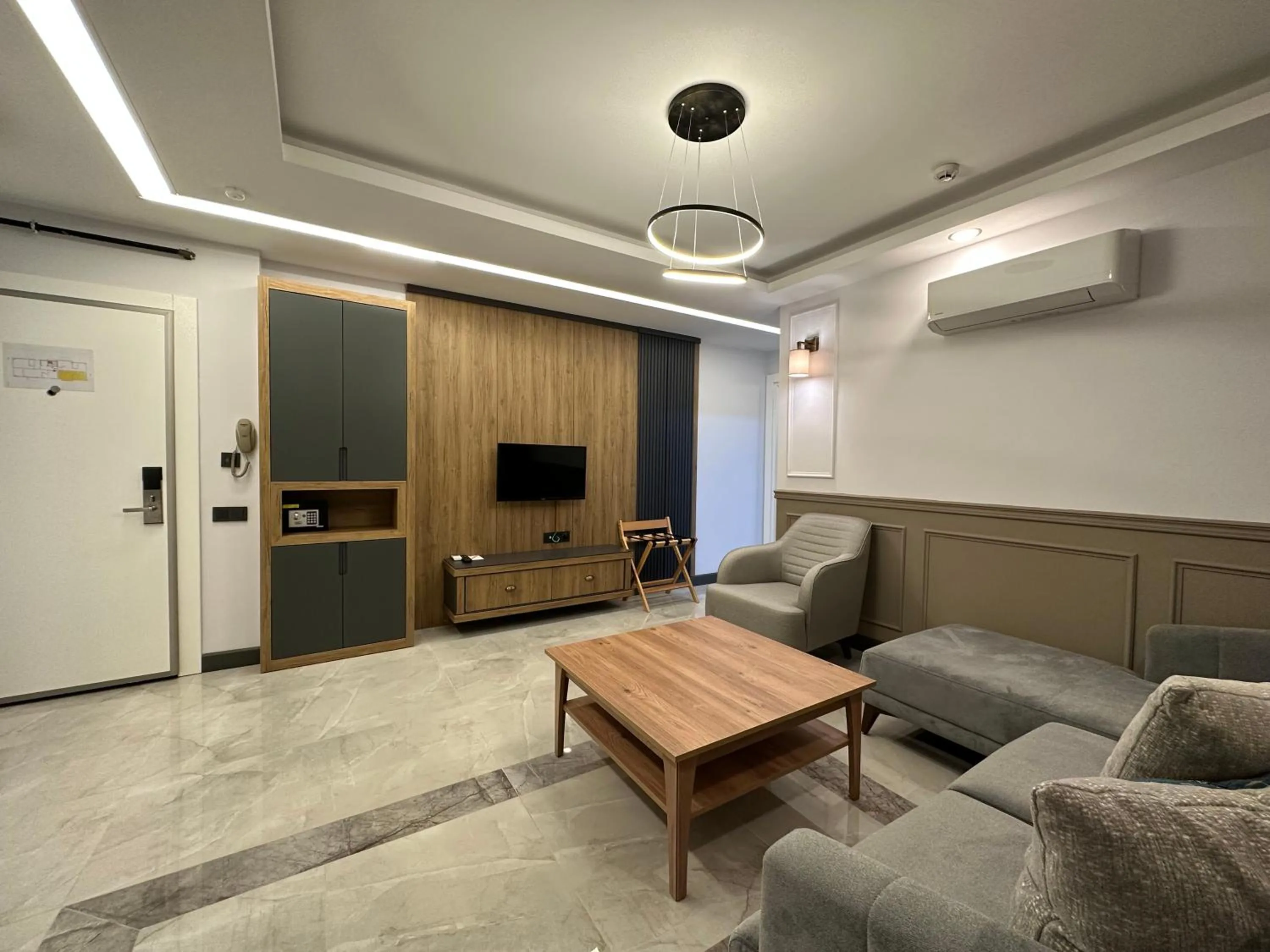 Living room in Quality Gold Suite Hotel