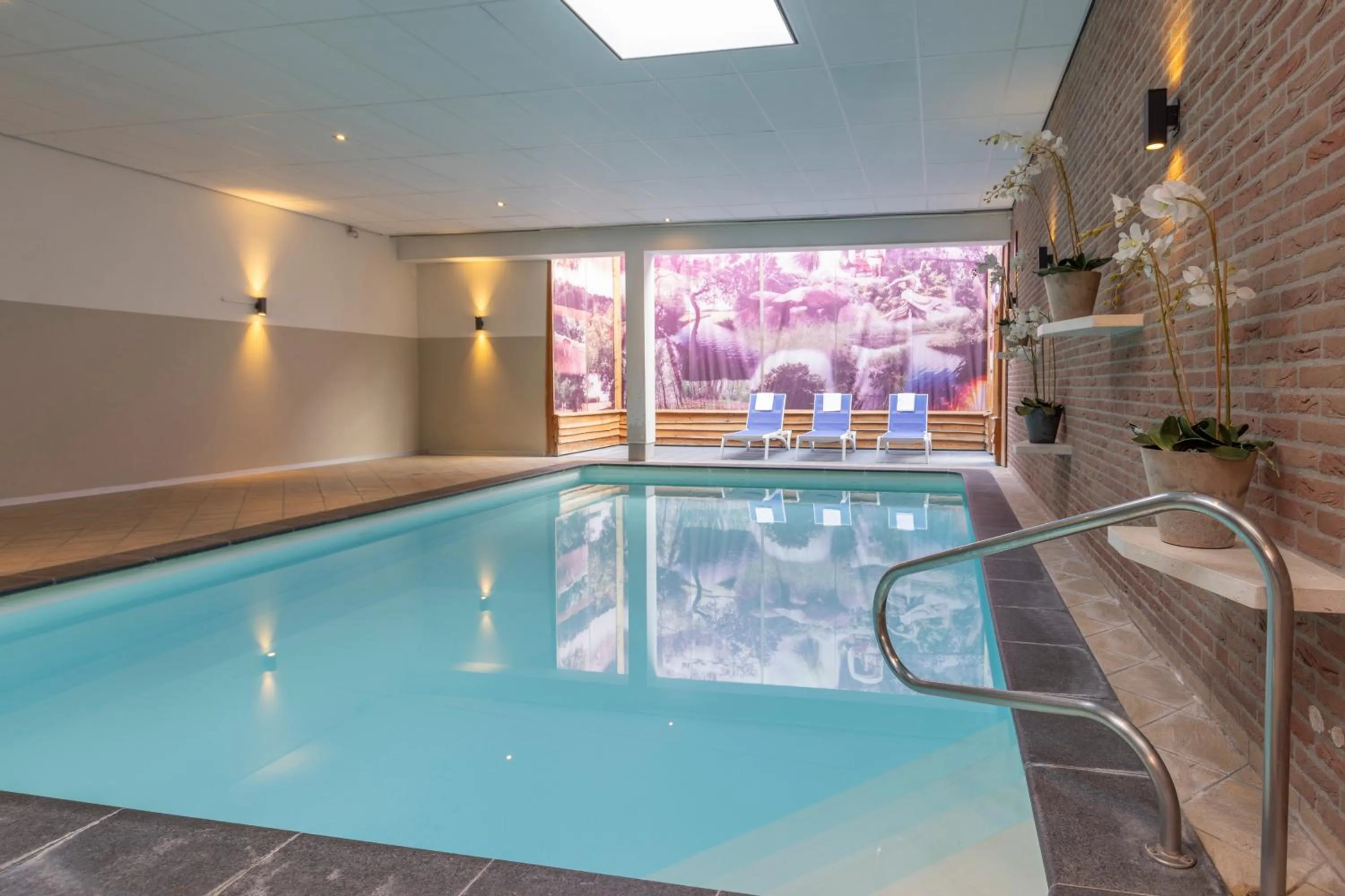 Swimming pool in Fletcher Hotel - Restaurant de Zeegser Duinen