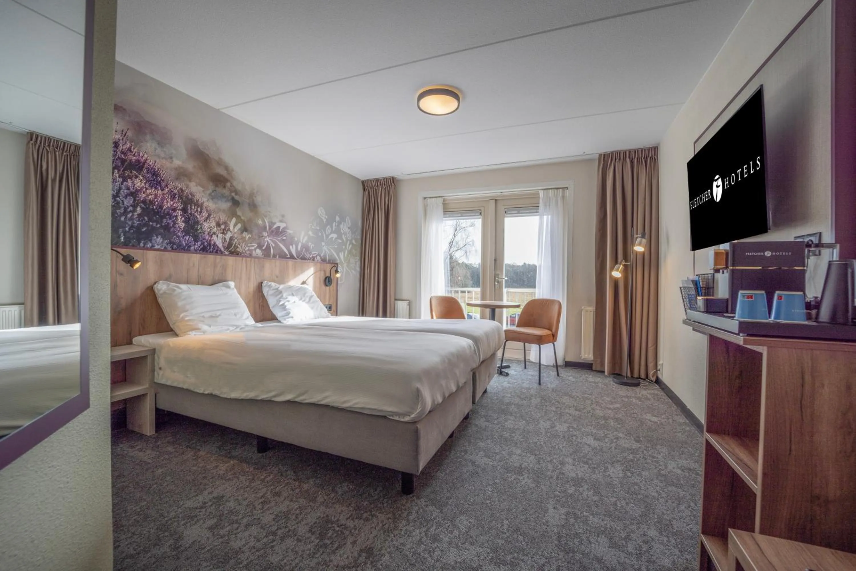 Photo of the whole room, Bed in Fletcher Hotel - Restaurant de Zeegser Duinen