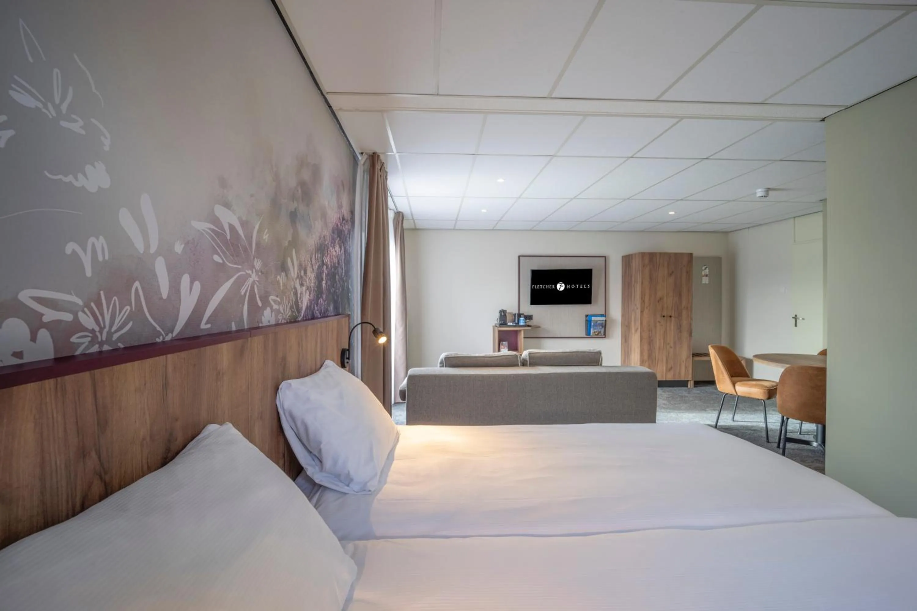 Photo of the whole room, Bed in Fletcher Hotel - Restaurant de Zeegser Duinen