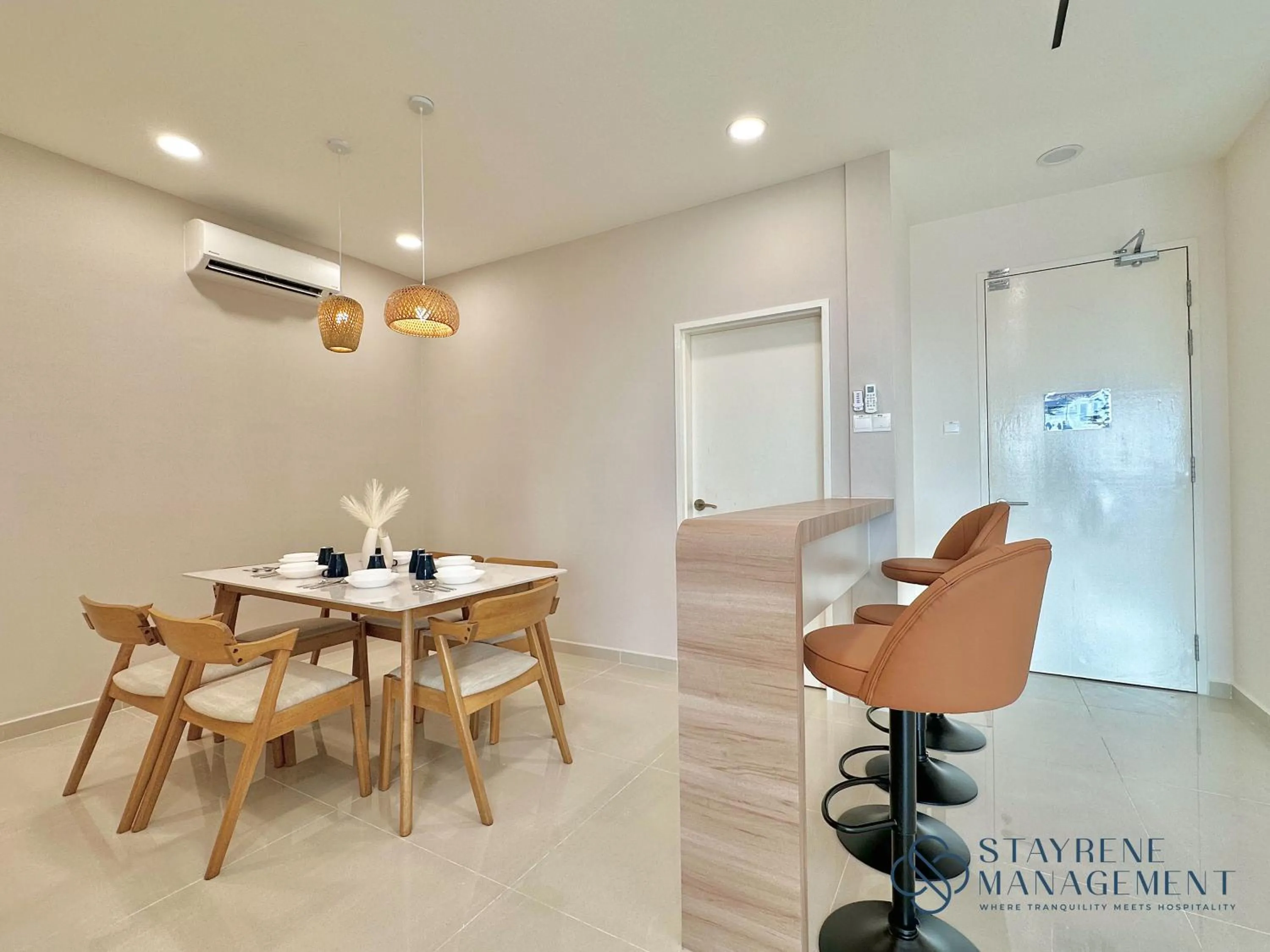 Seating area in SKS Pavillion Residences by Stayrene