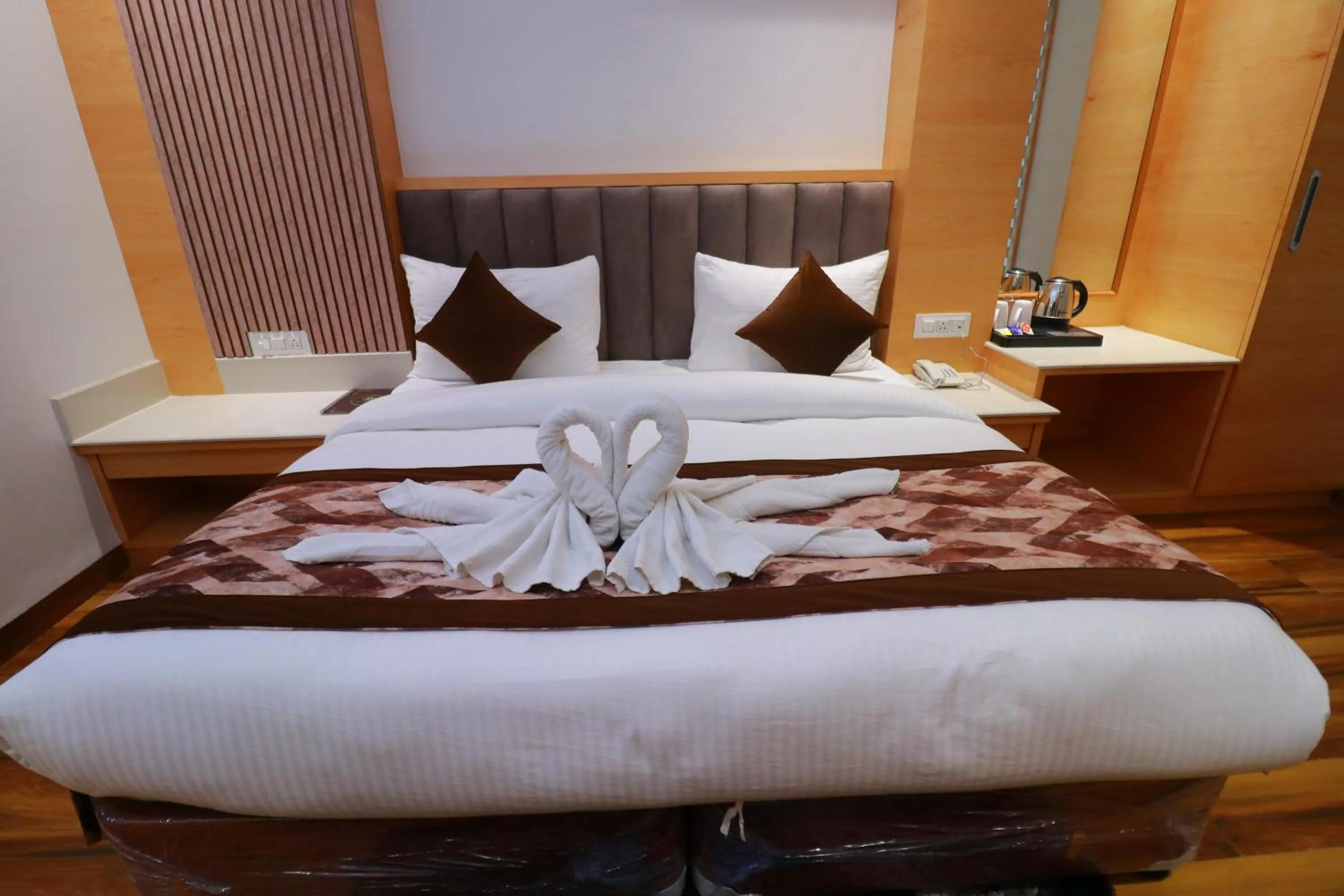 Photo of the whole room, Bed in Country Green Hotel & Banquet