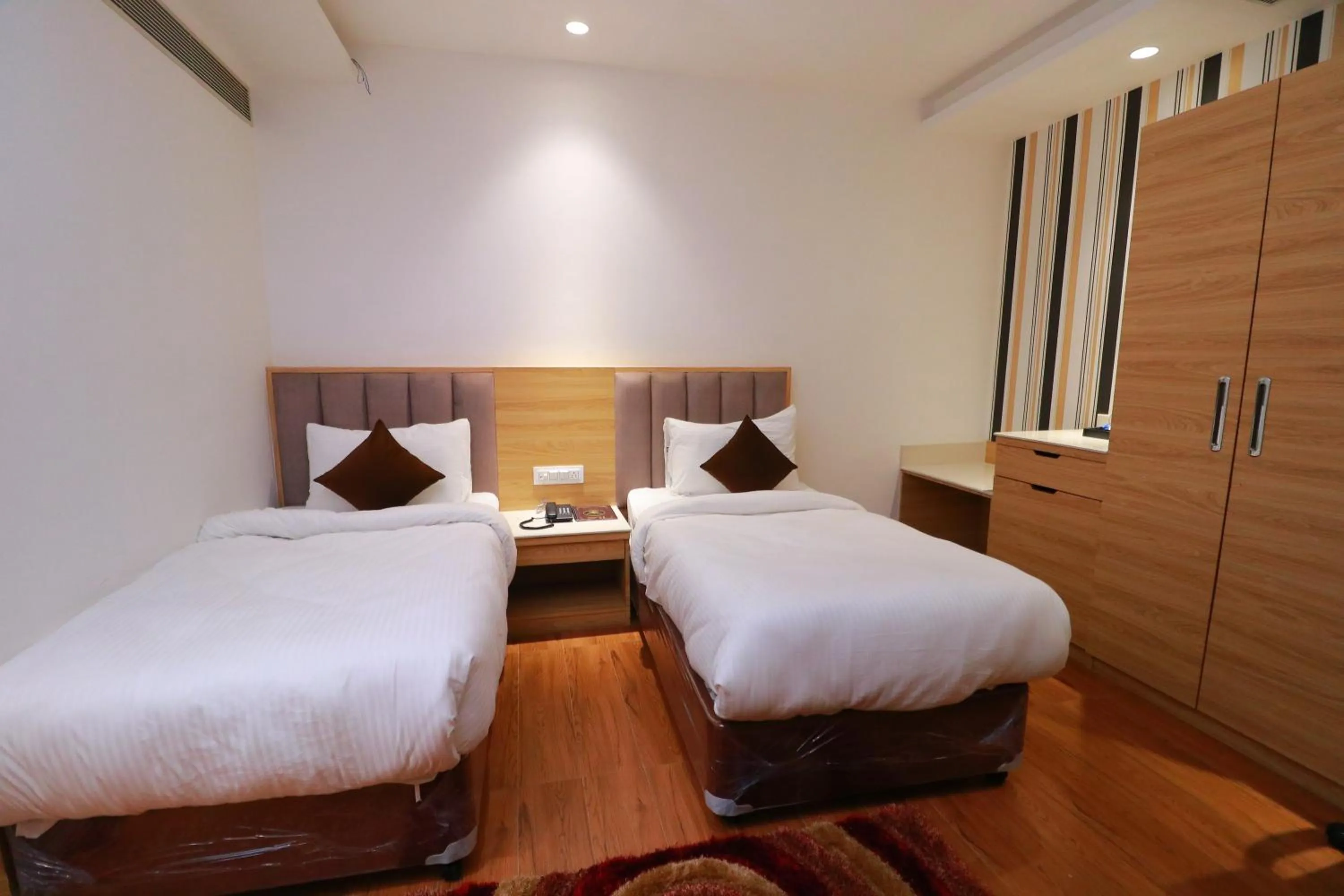 Bed in Country Green Hotel & Banquet