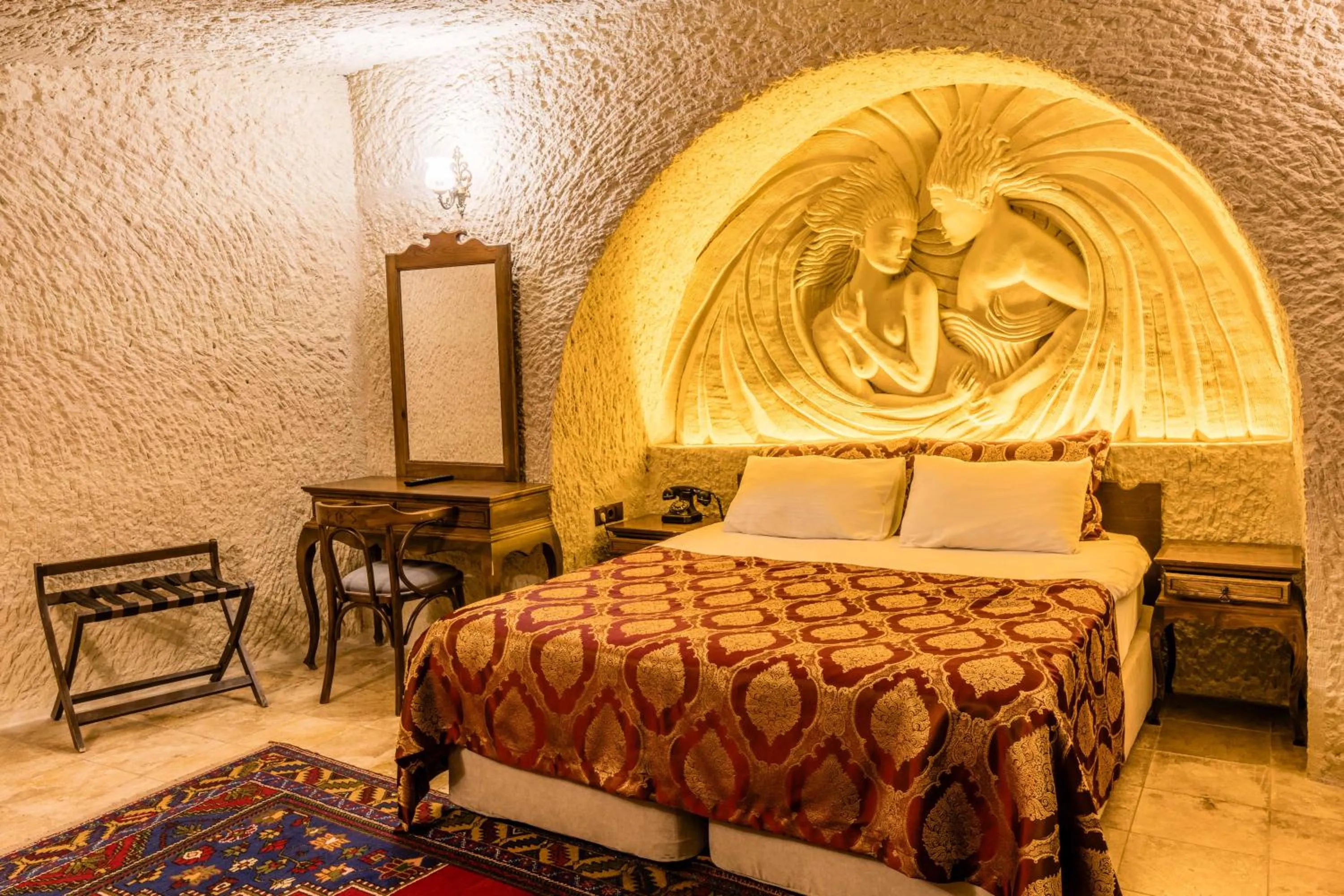 Bed in Phocas Cave Suites