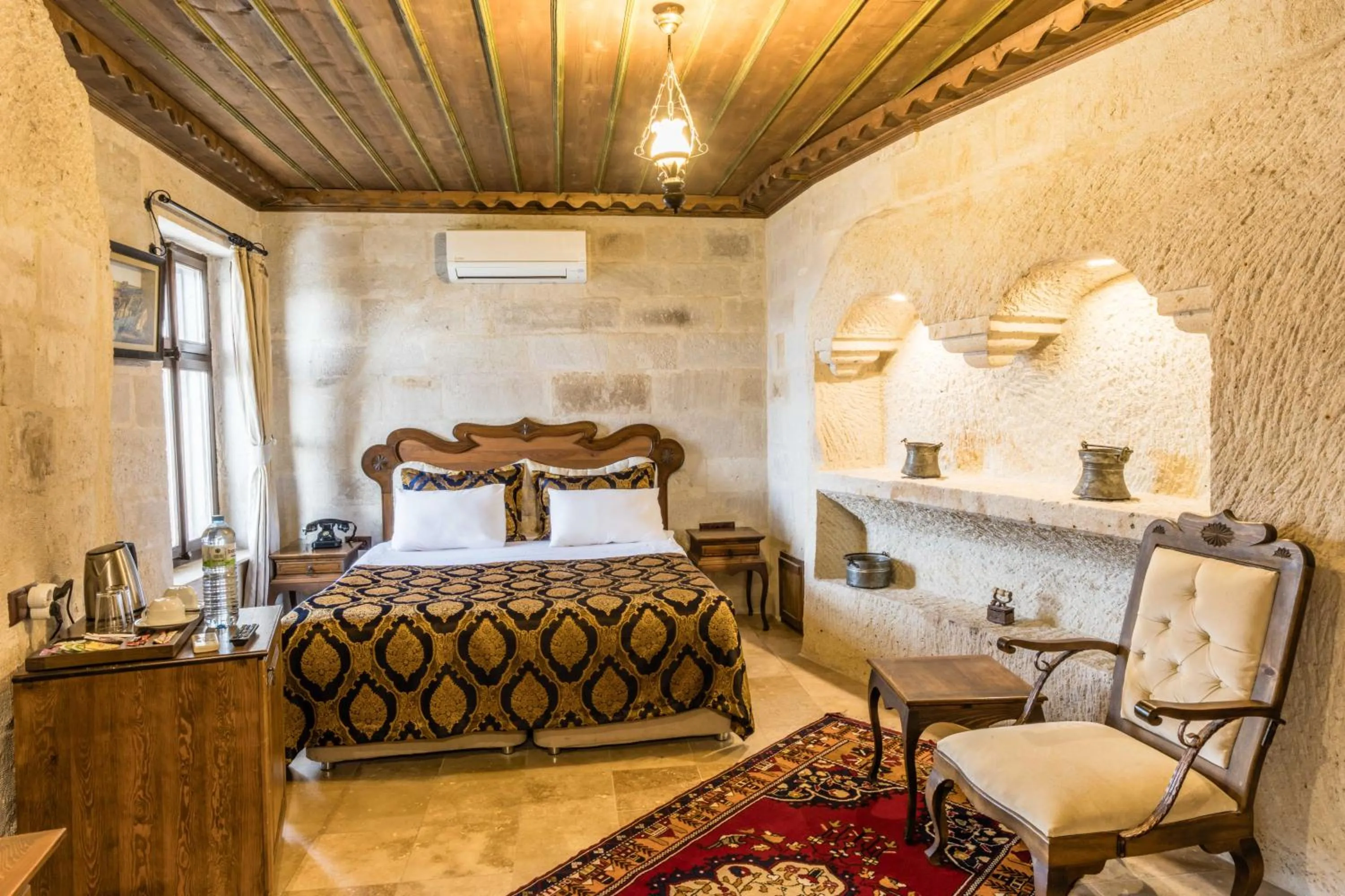 Bed in Phocas Cave Suites