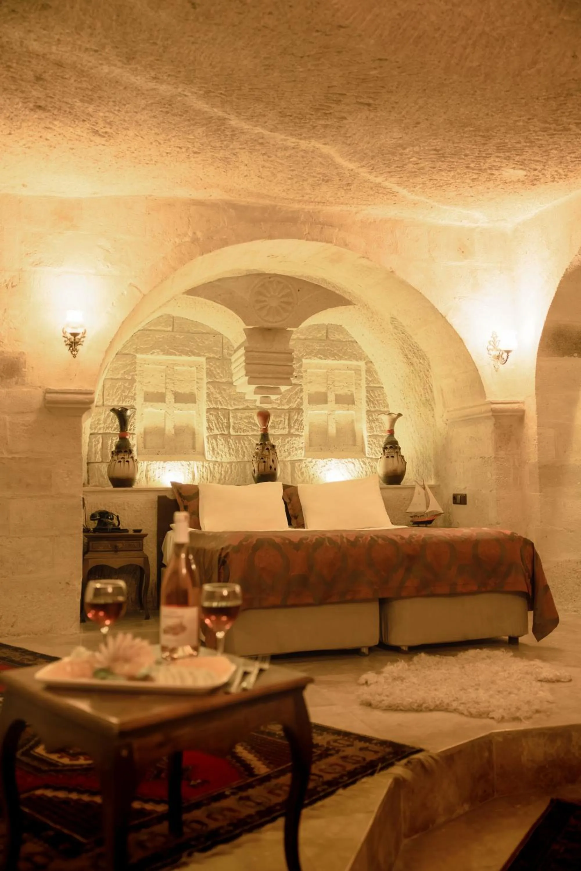 Bed in Phocas Cave Suites